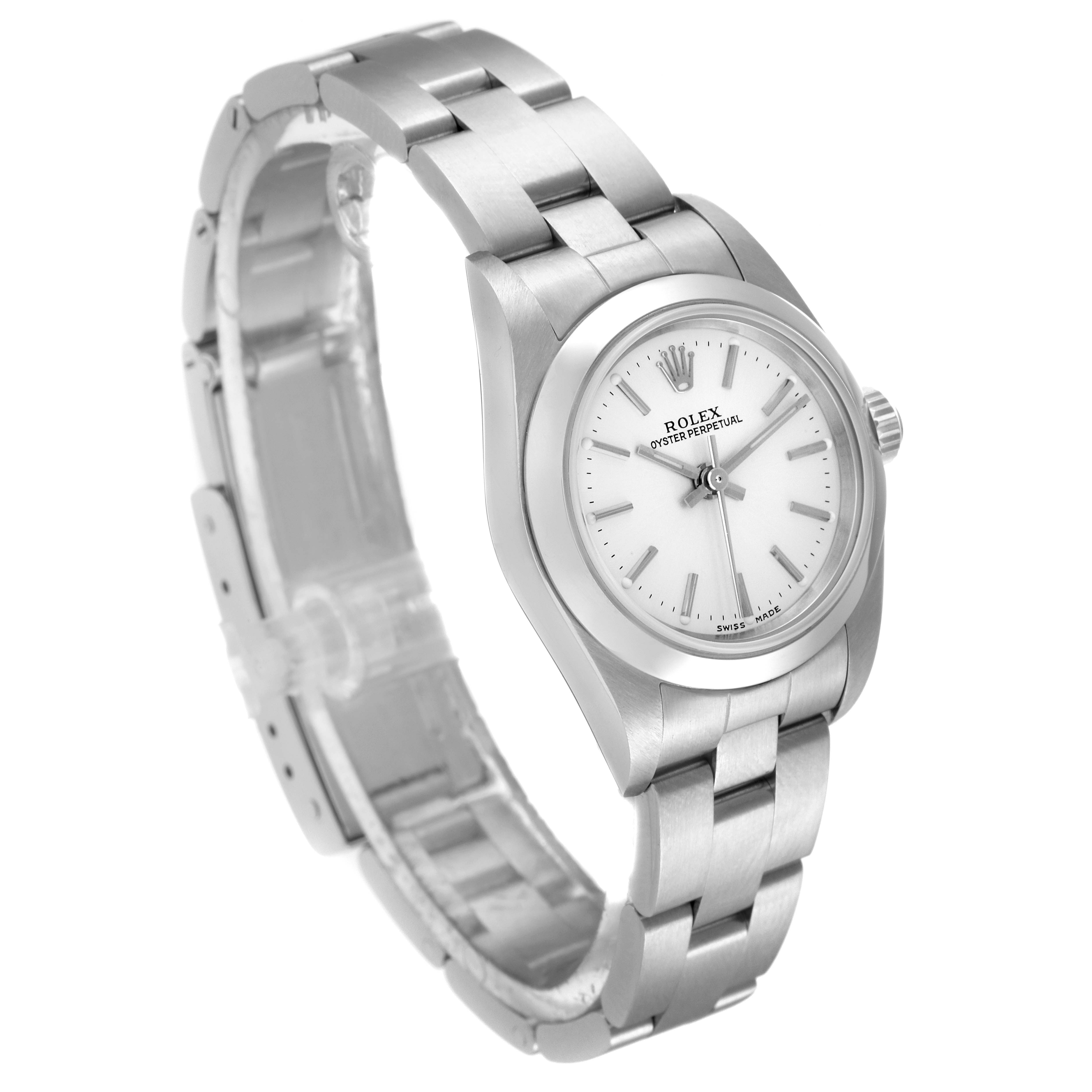 This image shows a Rolex Oyster Perpetual 76080 Women
s Stainless Steel Silver Dial 76080 Women
s Stainless Steel Silver Dial watch from a slight side angle, highlighting the bracelet, case, and dial.