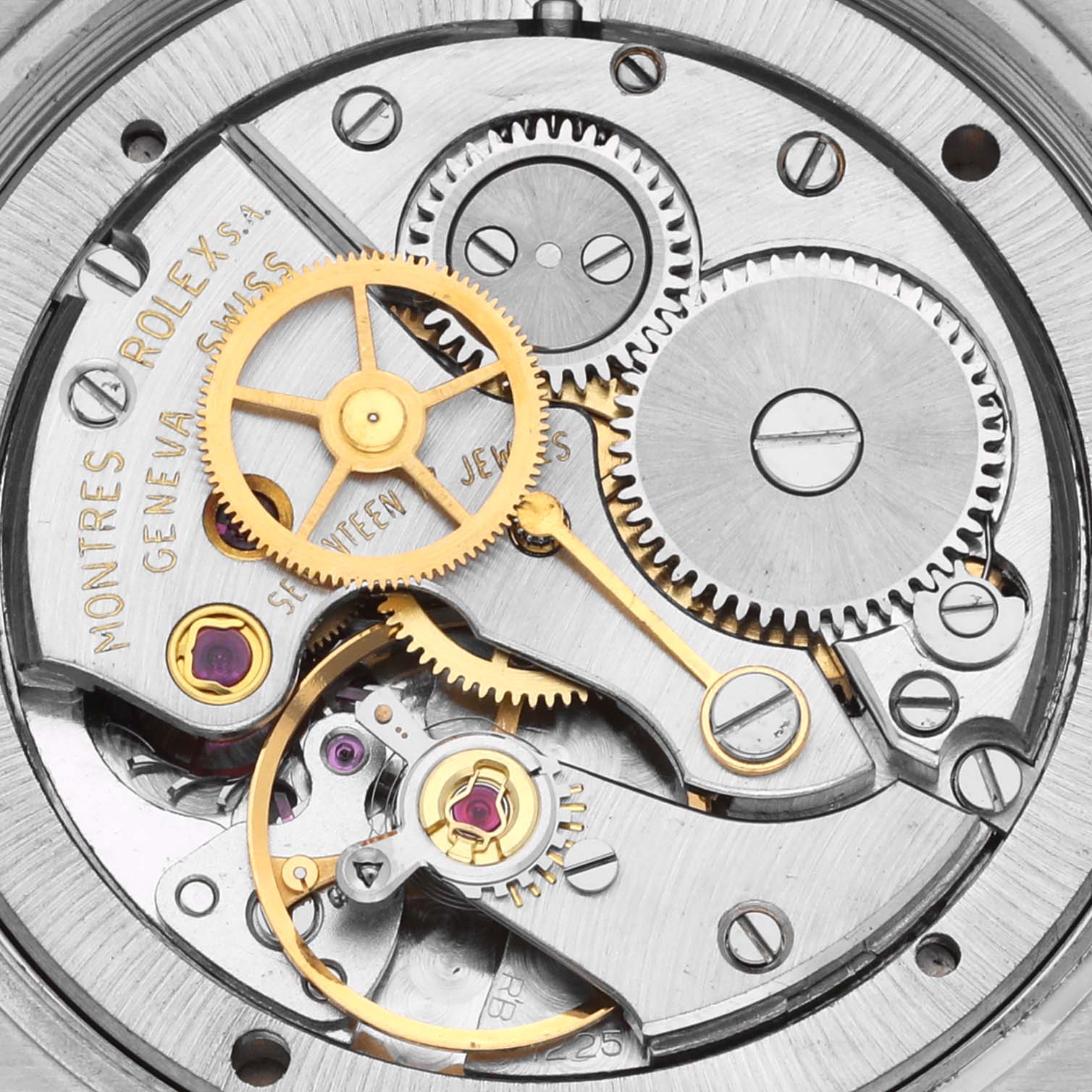 The image shows the intricate movement and gears of a Rolex Vintage Collection 6694 Men's Stainless Steel Silver Dial 6694 Men's Stainless Steel Silver Dial watch from a top-down angle.