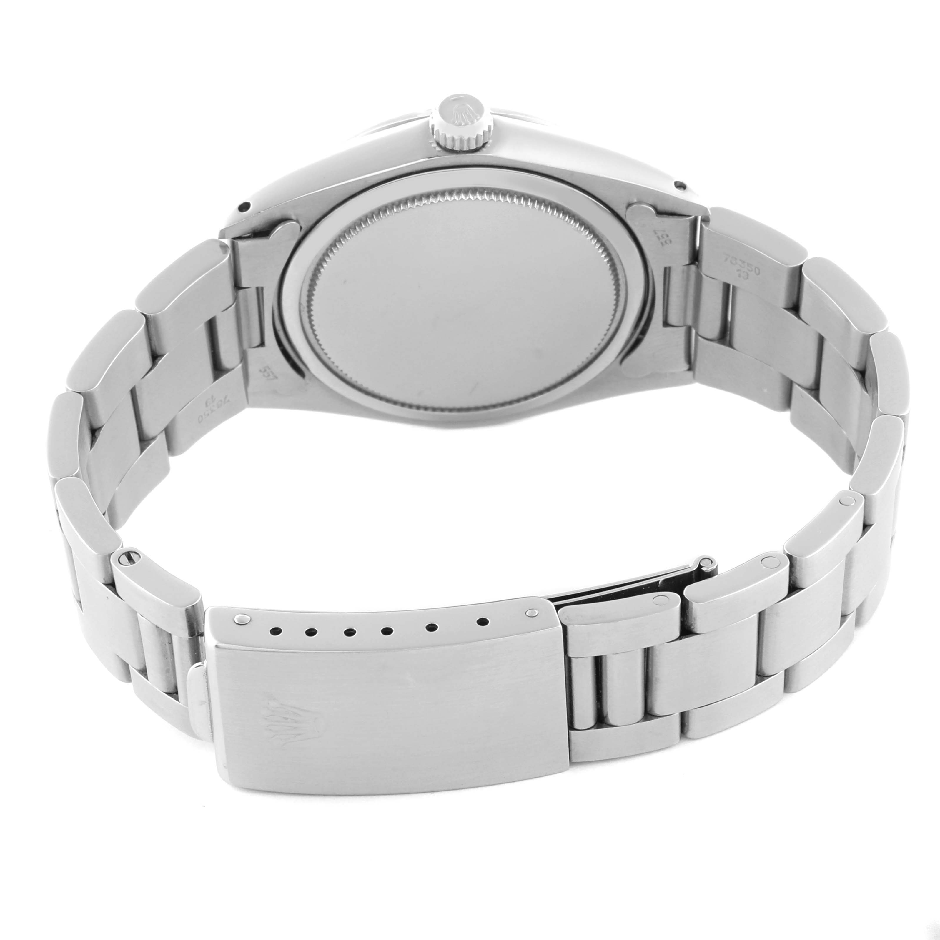 The image shows the back of a Rolex Vintage Collection 6694 Men's Stainless Steel Silver Dial 6694 Men's Stainless Steel Silver Dial watch, featuring its case back and bracelet.