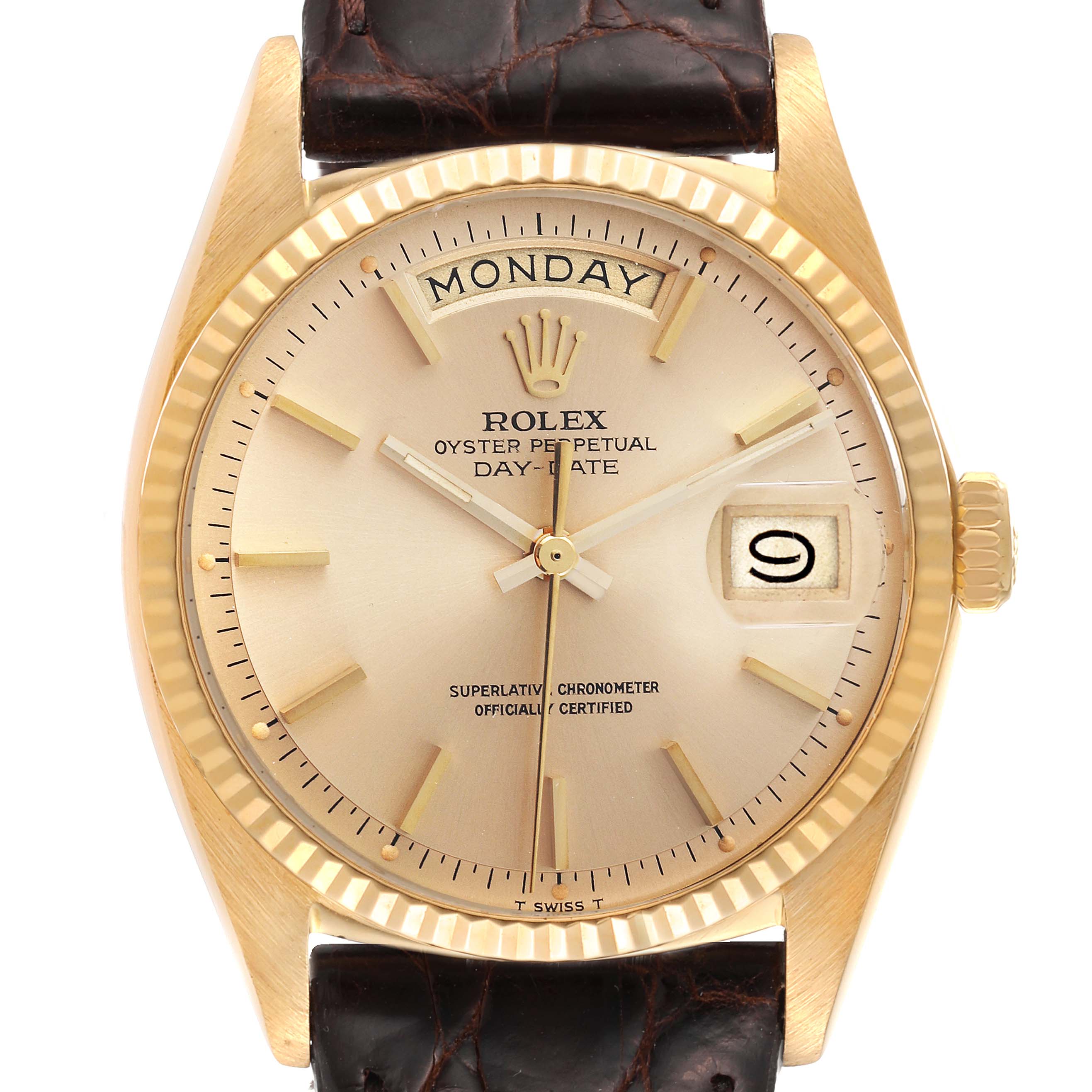 This is a close-up view of a Rolex Day-Date watch, showing the dial, hands, day, date, and part of the leather strap.