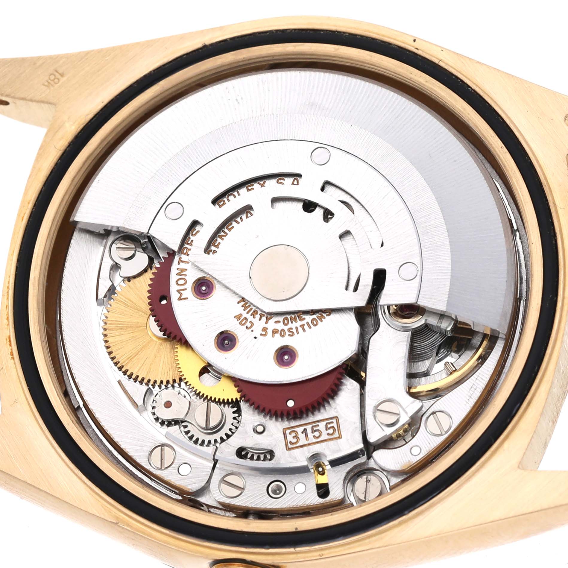 The image shows the back view of a Rolex President 18238 Men
s Yellow Gold Champagne Dial 18238 Men
s Yellow Gold Champagne Dial model, revealing its intricate movement components.