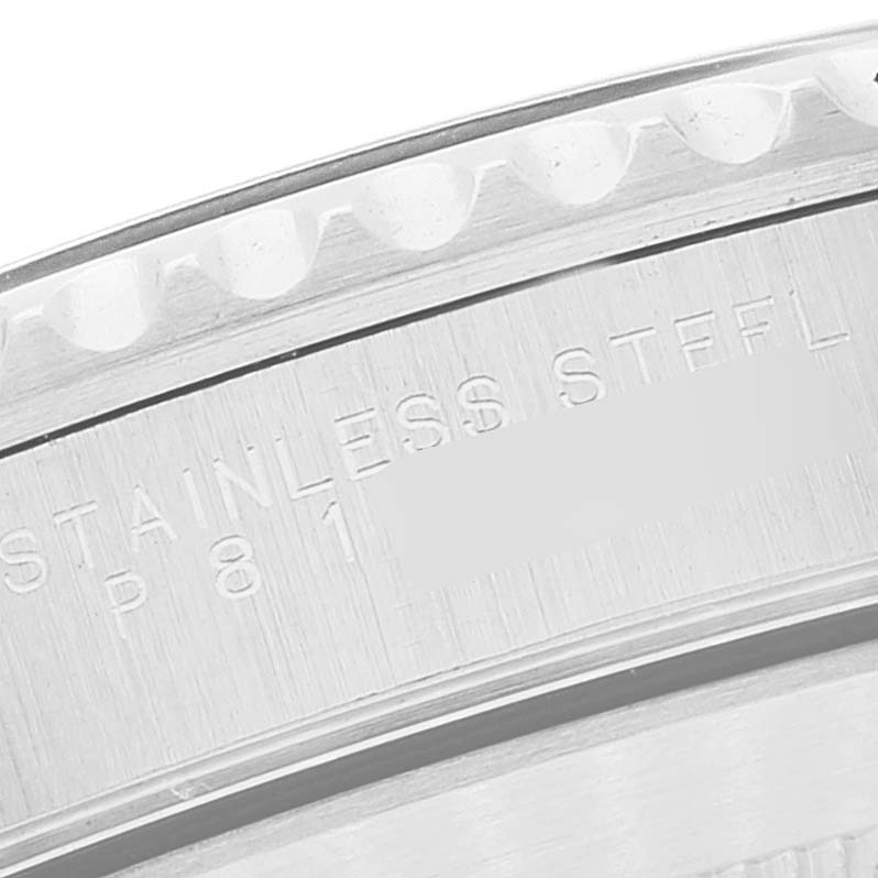 This close-up image shows the engraved stainless steel case of a Rolex Submariner 14060 Men
s Stainless Steel Black Dial 14060 Men
s Stainless Steel Black Dial watch.