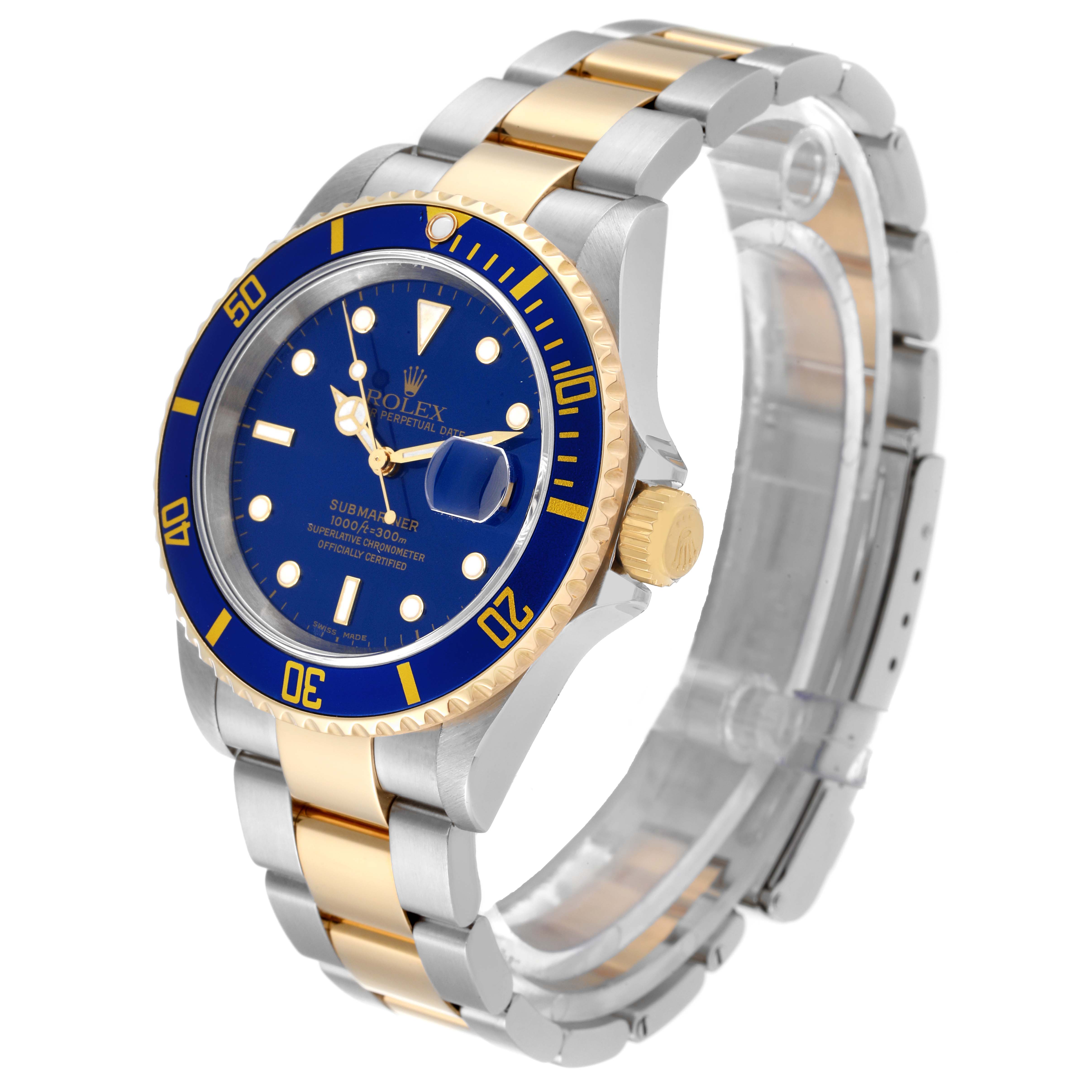 The image shows a Rolex Submariner 16613 Men's Steel and Gold (two tone) Blue Dial 16613 Men's Steel and Gold (two tone) Blue Dial watch at a side angle, highlighting its blue dial, bezel, and two-tone metal strap with gold accents.