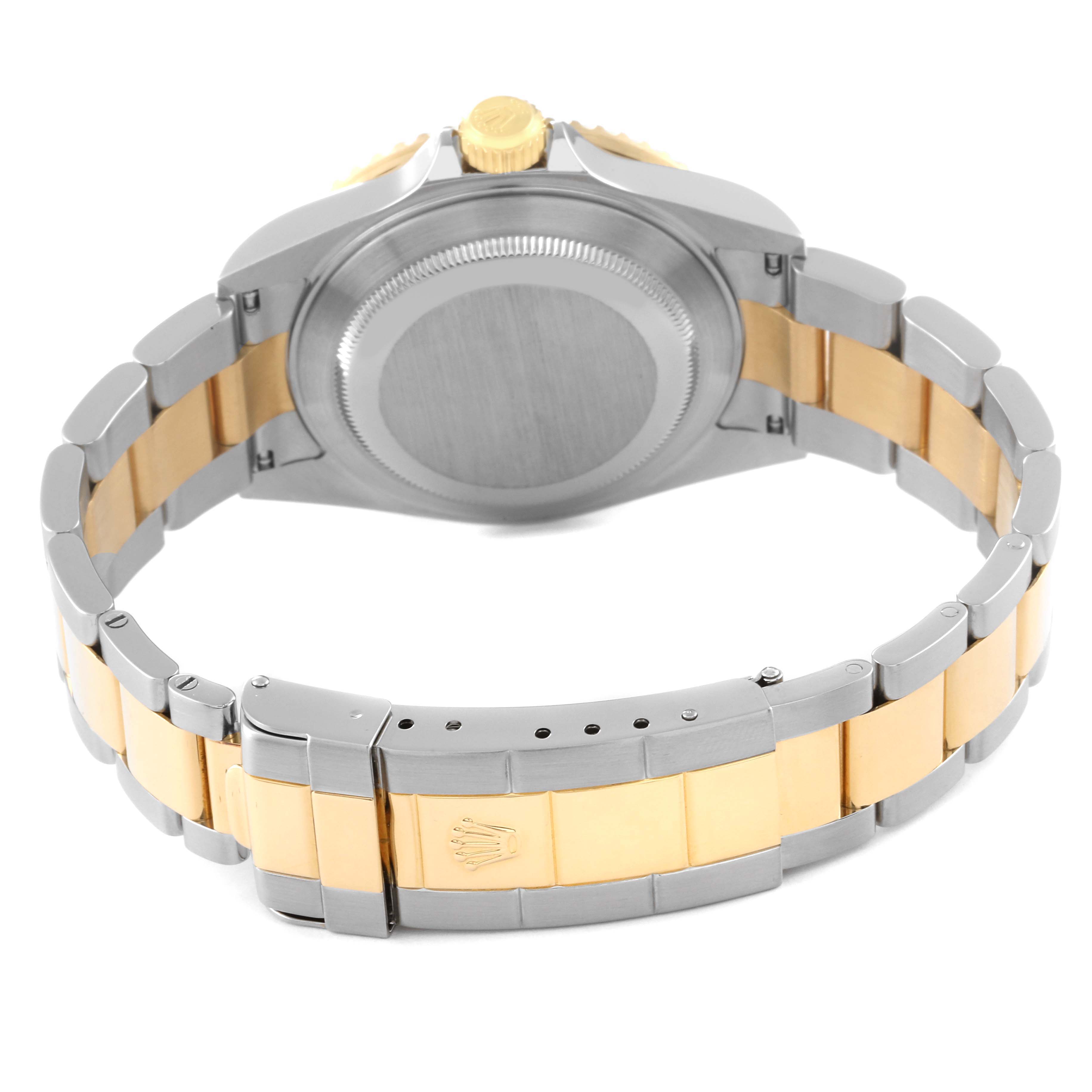 This image shows the back view of a Rolex Submariner 16613 Men's Steel and Gold (two tone) Blue Dial 16613 Men's Steel and Gold (two tone) Blue Dial, highlighting the two-tone metal bracelet and case back.