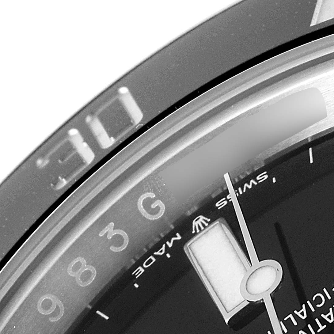 This close-up image shows the bezel, part of the dial, and the minute hand of the Rolex Submariner 126610 Men
s Stainless Steel Black Dial 126610 Men
s Stainless Steel Black Dial watch.