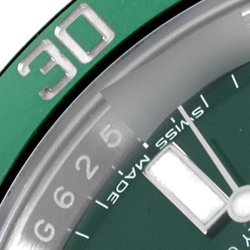 The image shows a close-up of the green bezel and part of the dial of a Rolex Submariner 116610LV Men's Stainless Steel Green Dial 116610LV Men's Stainless Steel Green Dial watch, highlighting the number 30.
