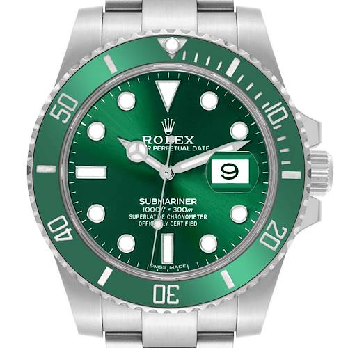 The Rolex Submariner watch is shown from a front angle, highlighting the green dial and bezel with a date display.