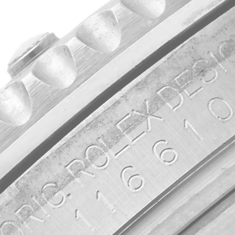 The image shows a close-up angle of the Rolex Submariner 116610LV Men's Stainless Steel Green Dial 116610LV Men's Stainless Steel Green Dial's engraved side and bezel detail.