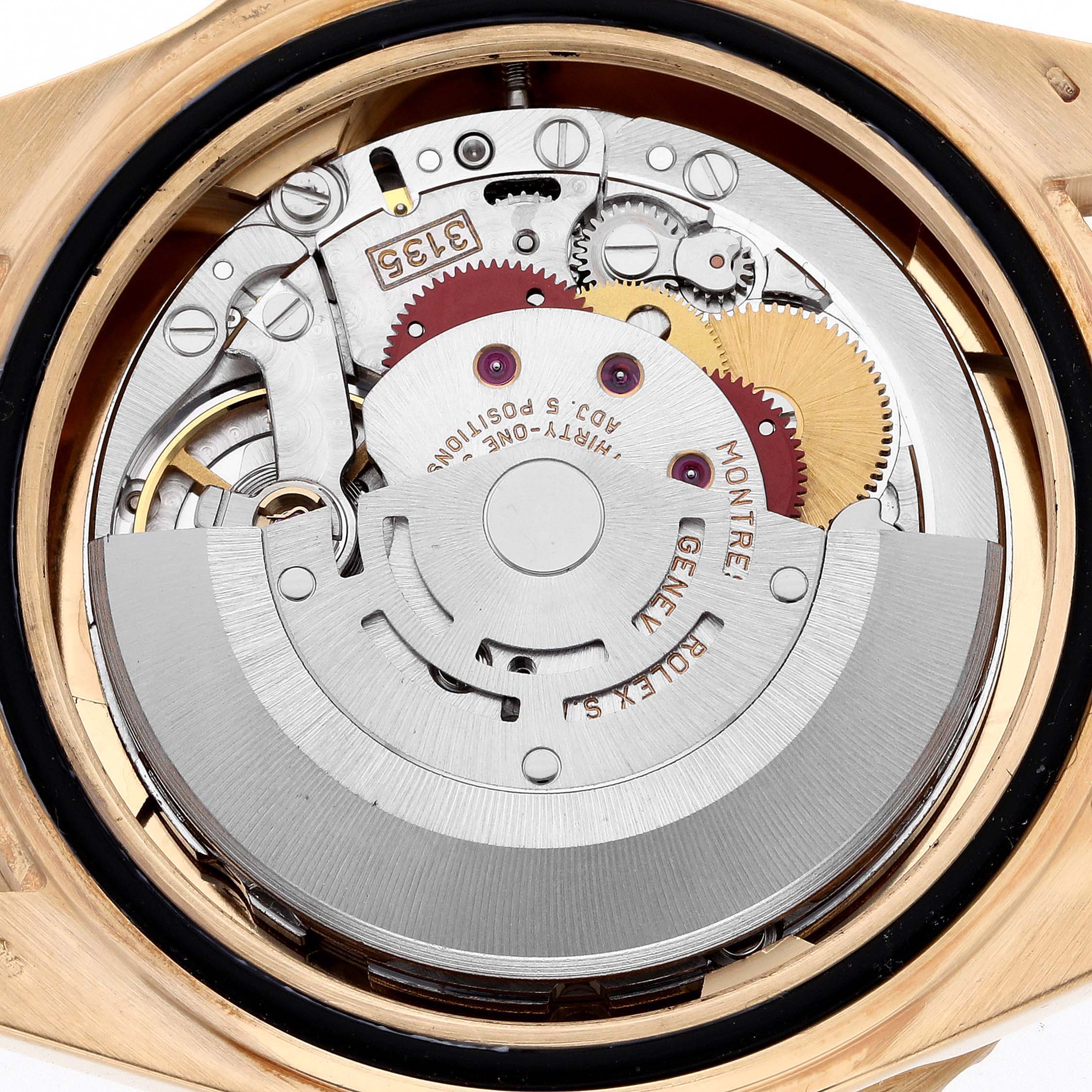 The image shows the internal movement of a Rolex Submariner 16618 Men's Yellow Gold Black Dial 16618 Men's Yellow Gold Black Dial watch from a top-down angle, revealing its mechanical components.