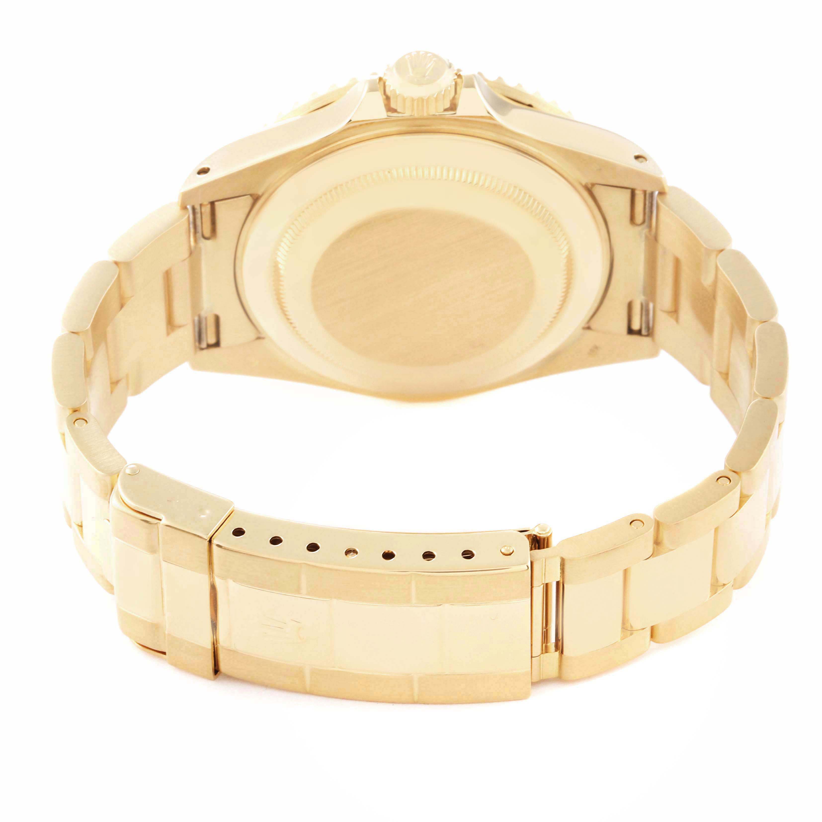 The image shows the back and bracelet of a Rolex Submariner 16618 Men's Yellow Gold Blue Dial, highlighting the clasp and case back from a rear angle.