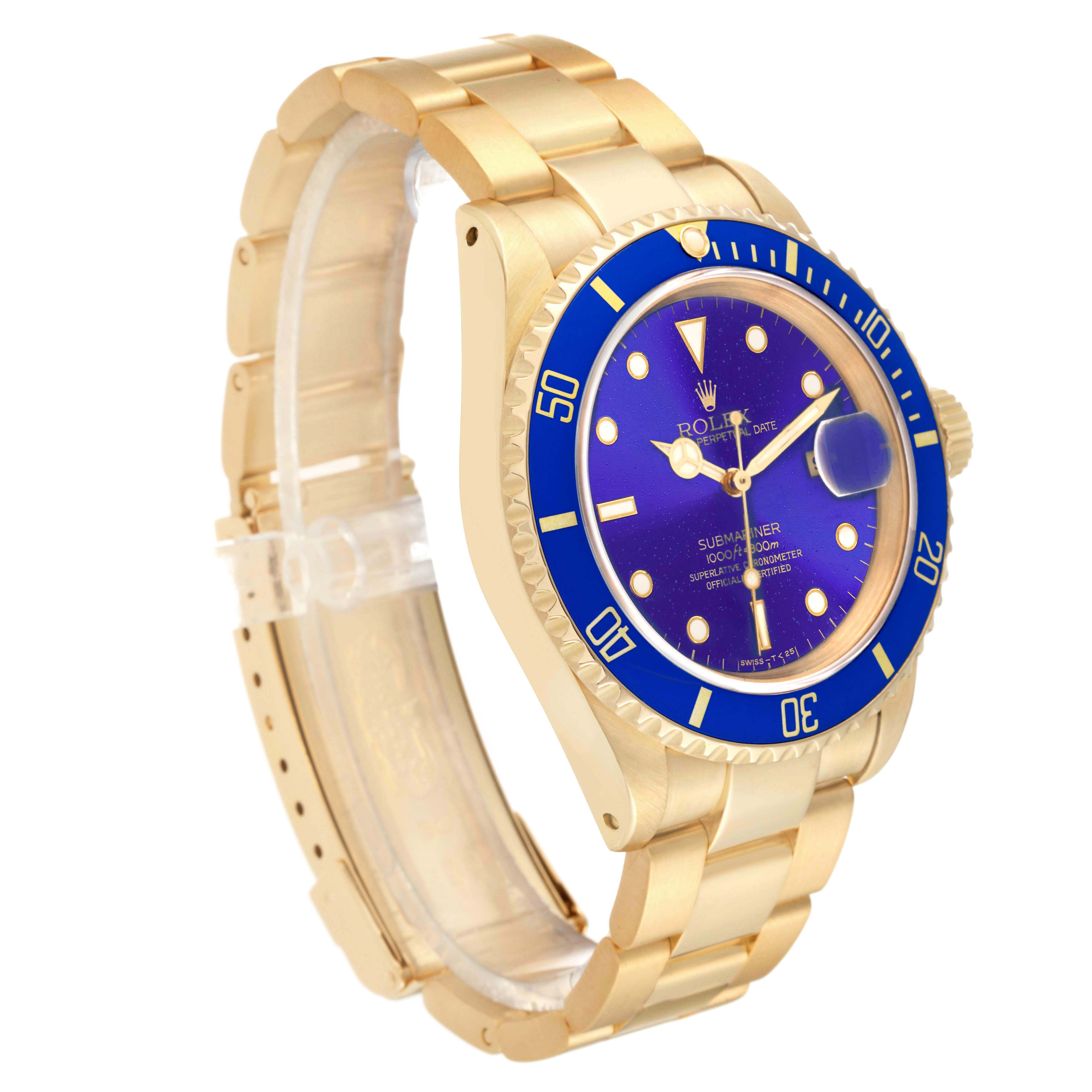 The Rolex Submariner 16618 Men's Yellow Gold Blue Dial watch is shown at a three-quarter angle, highlighting the bezel, dial, and bracelet.