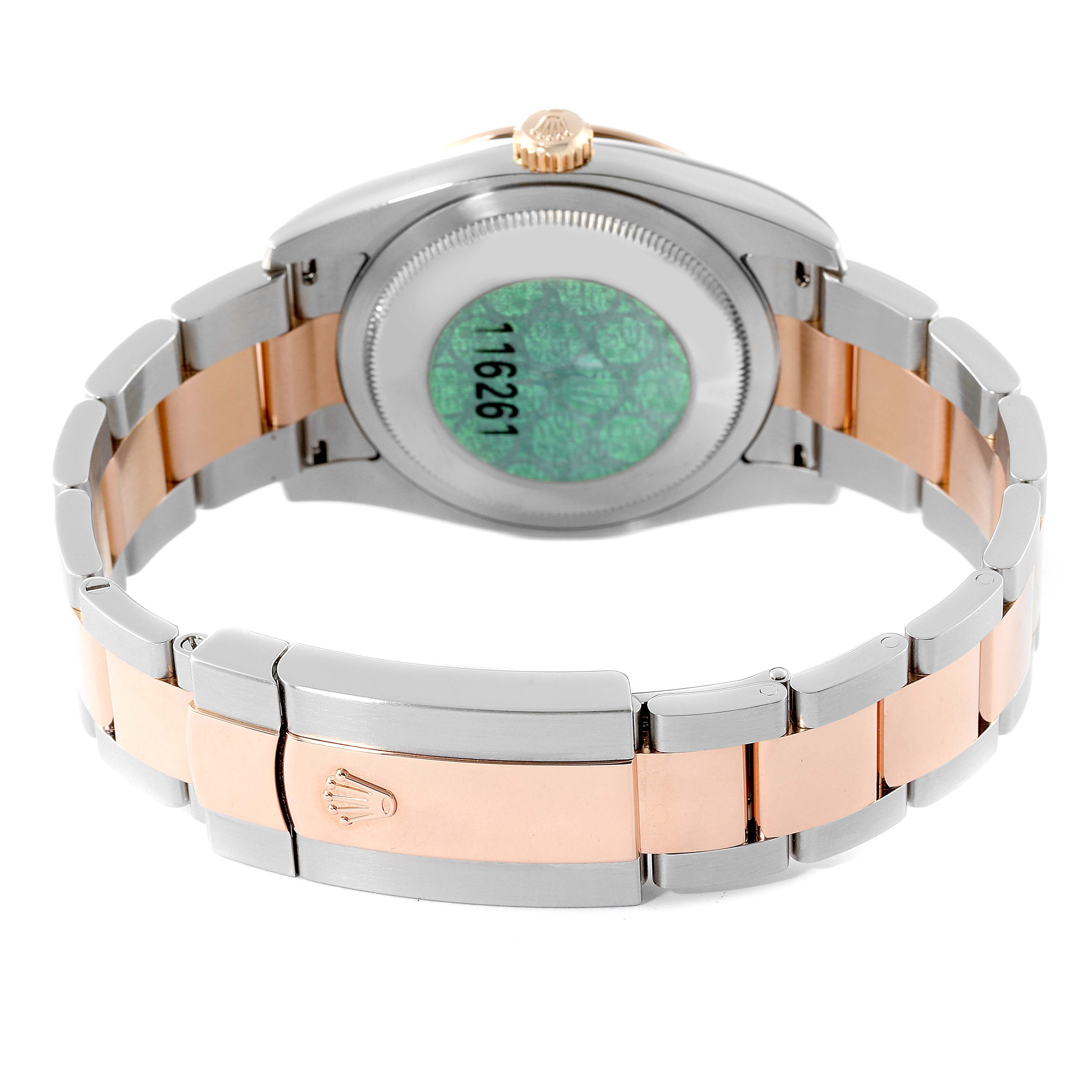 The image shows the back view of a Rolex Turn-o-Graph 116261 Men
s Steel and Gold (two tone) Black Dial 116261 Men
s Steel and Gold (two tone) Black Dial watch, highlighting the case back, the bracelet, and the clasp.