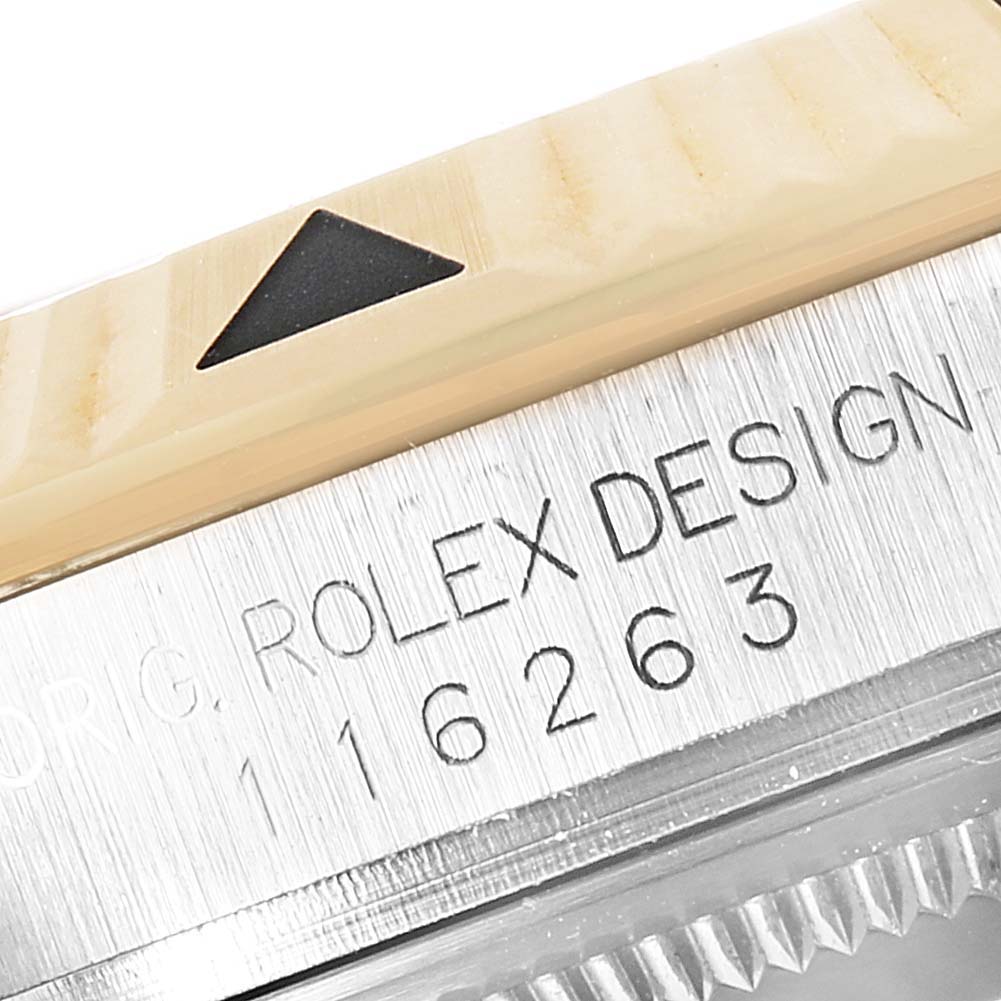 The image shows a close-up angle of the bezel and case marking on a Rolex Turn-o-Graph 116263 Men's Steel and Gold (two tone) Black Dial 116263 Men's Steel and Gold (two tone) Black Dial watch.