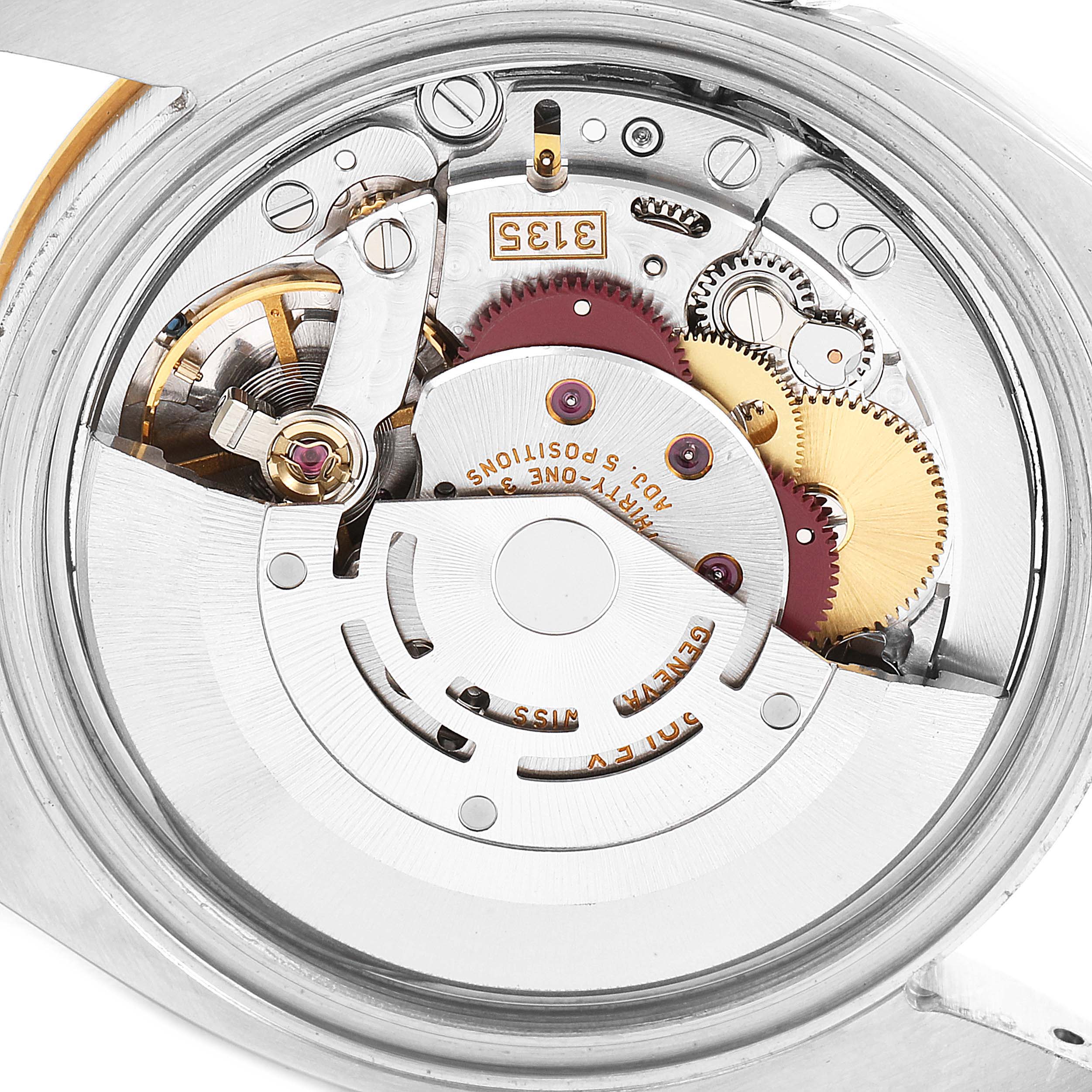 This image shows the intricate internal mechanism of a Rolex Turn-o-Graph 116263 Men's Steel and Gold (two tone) Black Dial 116263 Men's Steel and Gold (two tone) Black Dial watch viewed from the back.