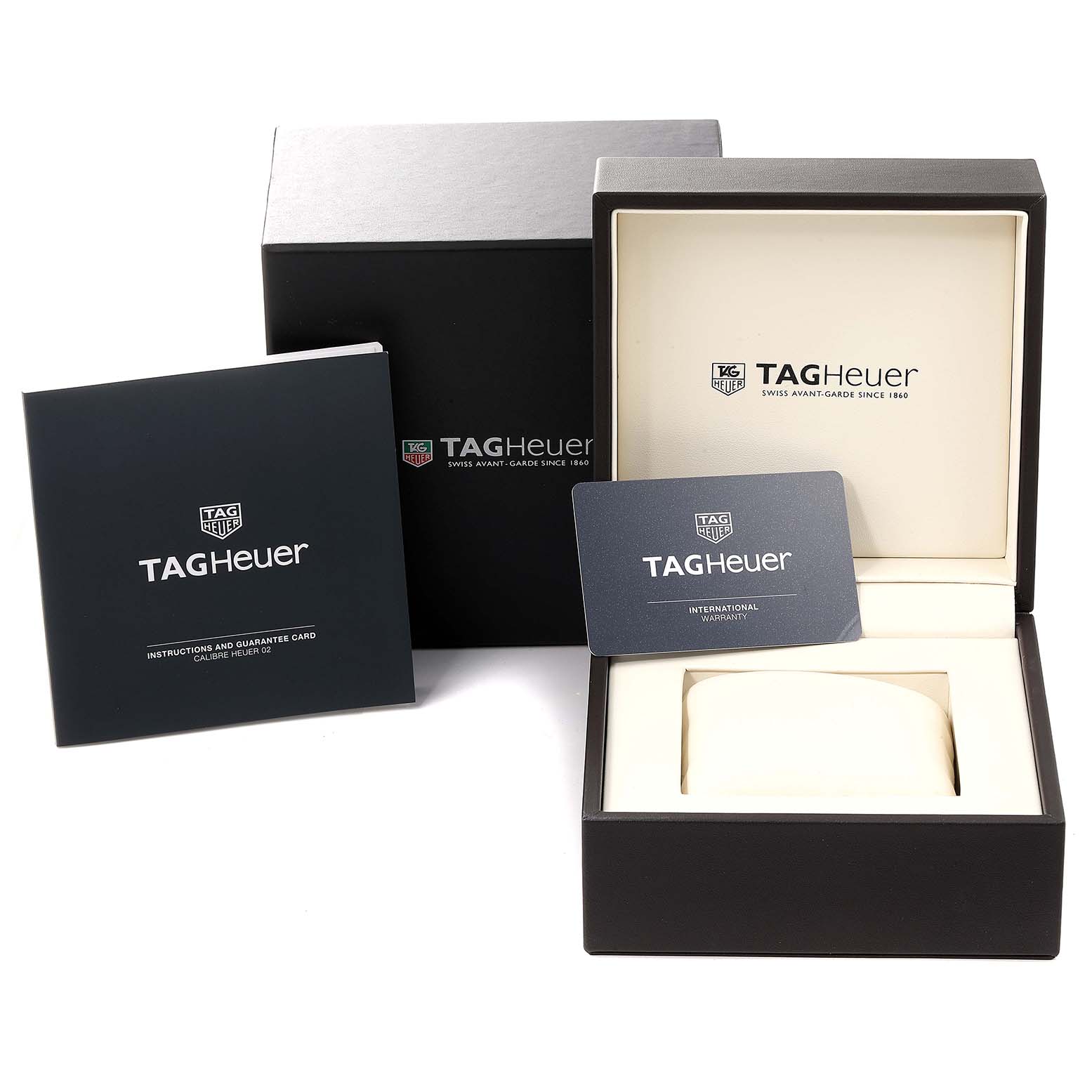 The image shows the packaging, instruction manual, guarantee card, and warranty card for a Tag Heuer Carrera CBG2A91.FT6173 Men's Ceramic Black Dial CBG2A91.FT6173 Men's Ceramic Black Dial model watch.