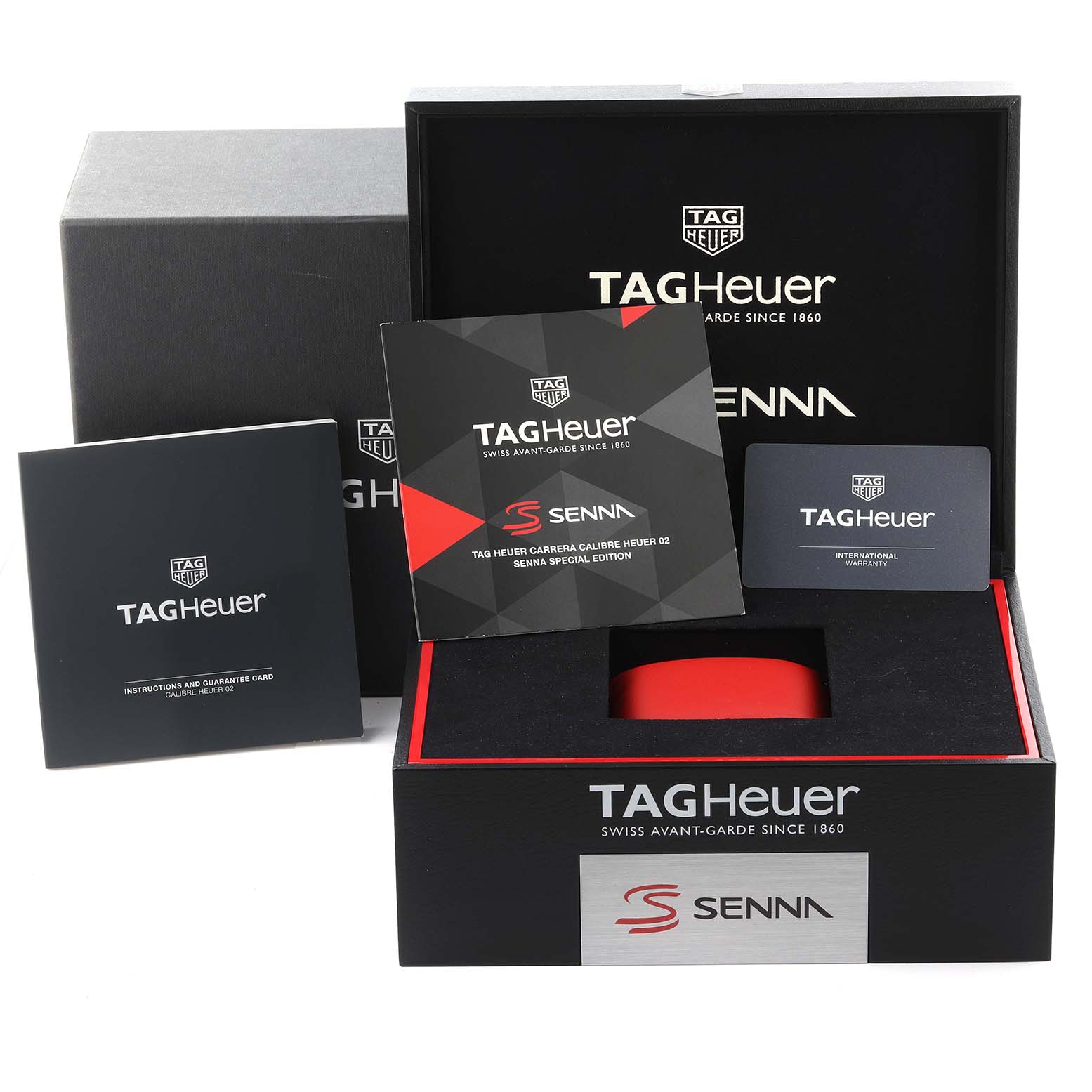 The image shows the packaging and accessories for the Tag Heuer Carrera CBG2013.BA0657 Men's Stainless Steel Black Dial CBG2013.BA0657 Men's Stainless Steel Black Dial model, including booklets and a storage box.