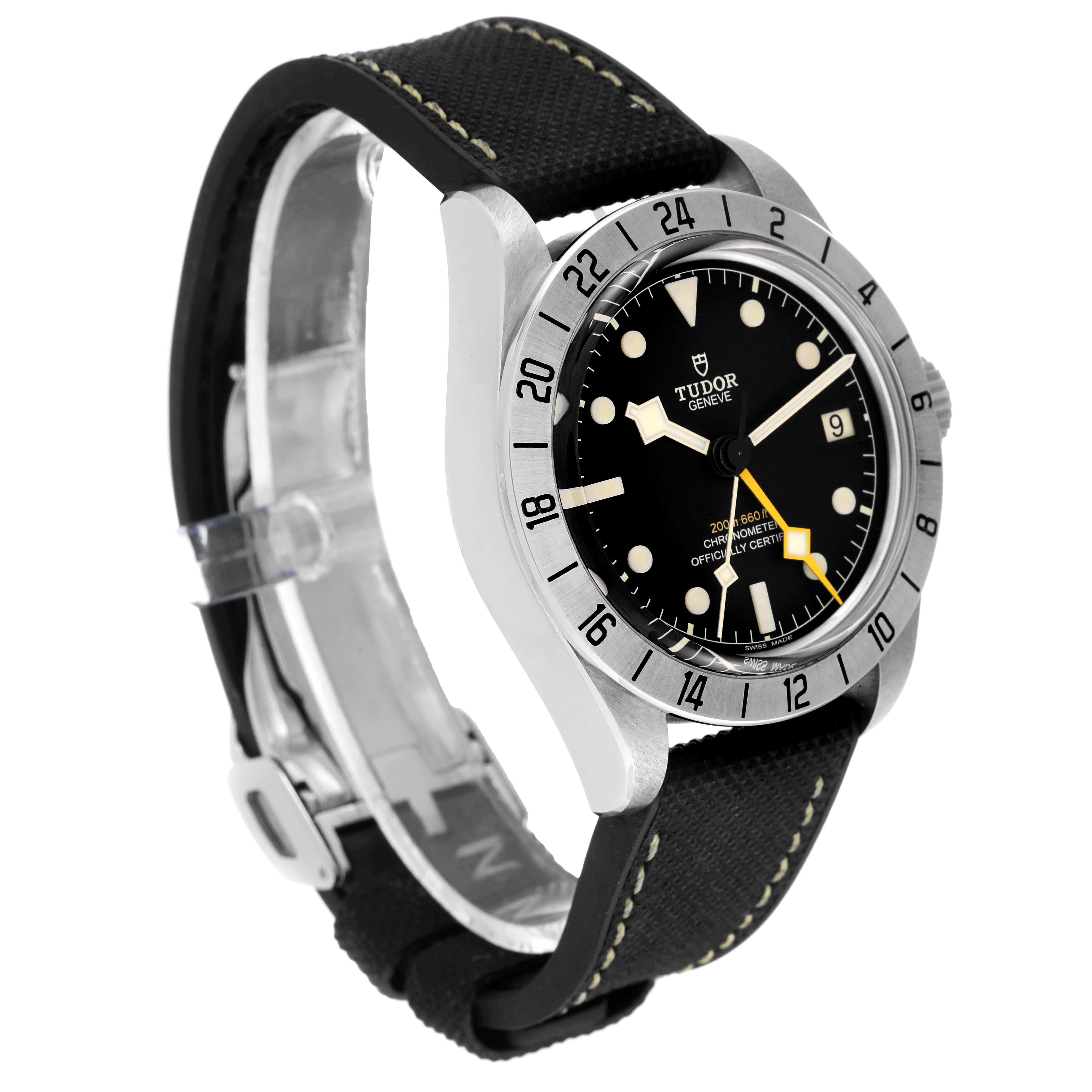 The image shows a side-angle view of the Tudor Heritage Black Bay M79470-0003 Men
s Stainless Steel Black Dial M79470-0003 Men
s Stainless Steel Black Dial watch, highlighting its face, bezel, lugs, and fabric strap.