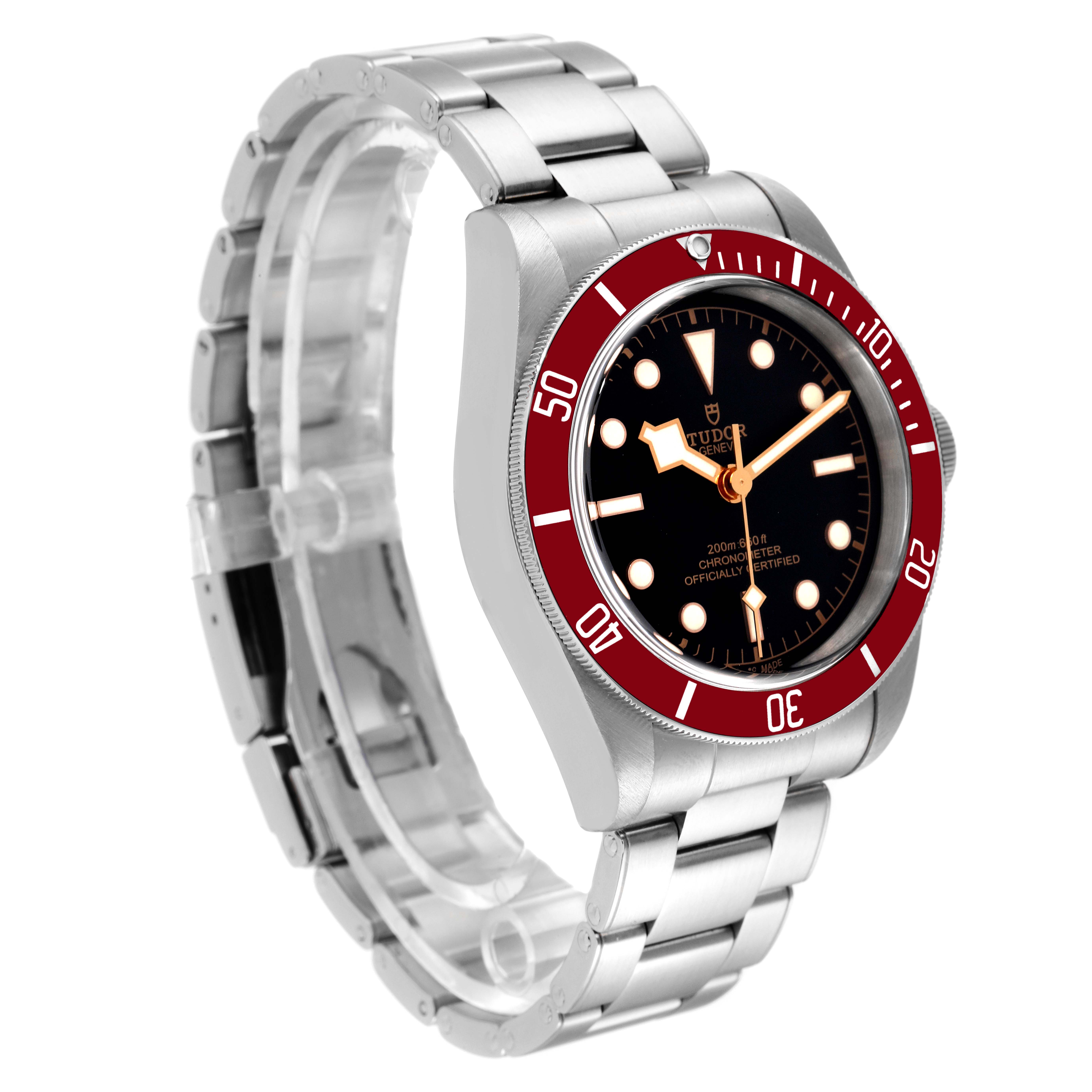 A Tudor Heritage Black Bay 79230R Men's Stainless Steel Black Dial 79230R Men's Stainless Steel Black Dial model watch is shown at a three-quarter angle, displaying its bezel, dial, bracelet, and crown.