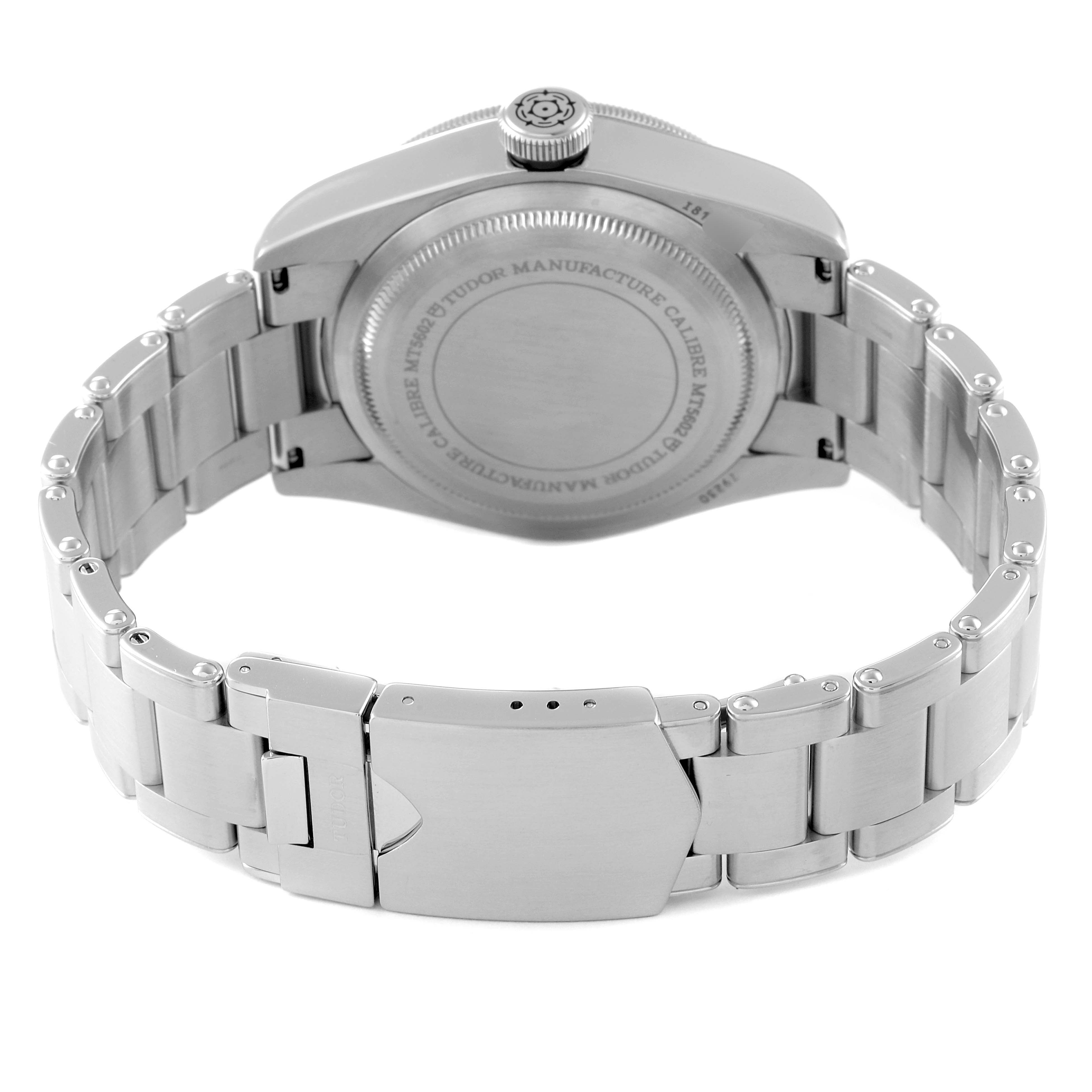 The image shows the back of the Tudor Heritage Black Bay 79230R Men's Stainless Steel Black Dial 79230R Men's Stainless Steel Black Dial watch, highlighting its case back and metal bracelet.