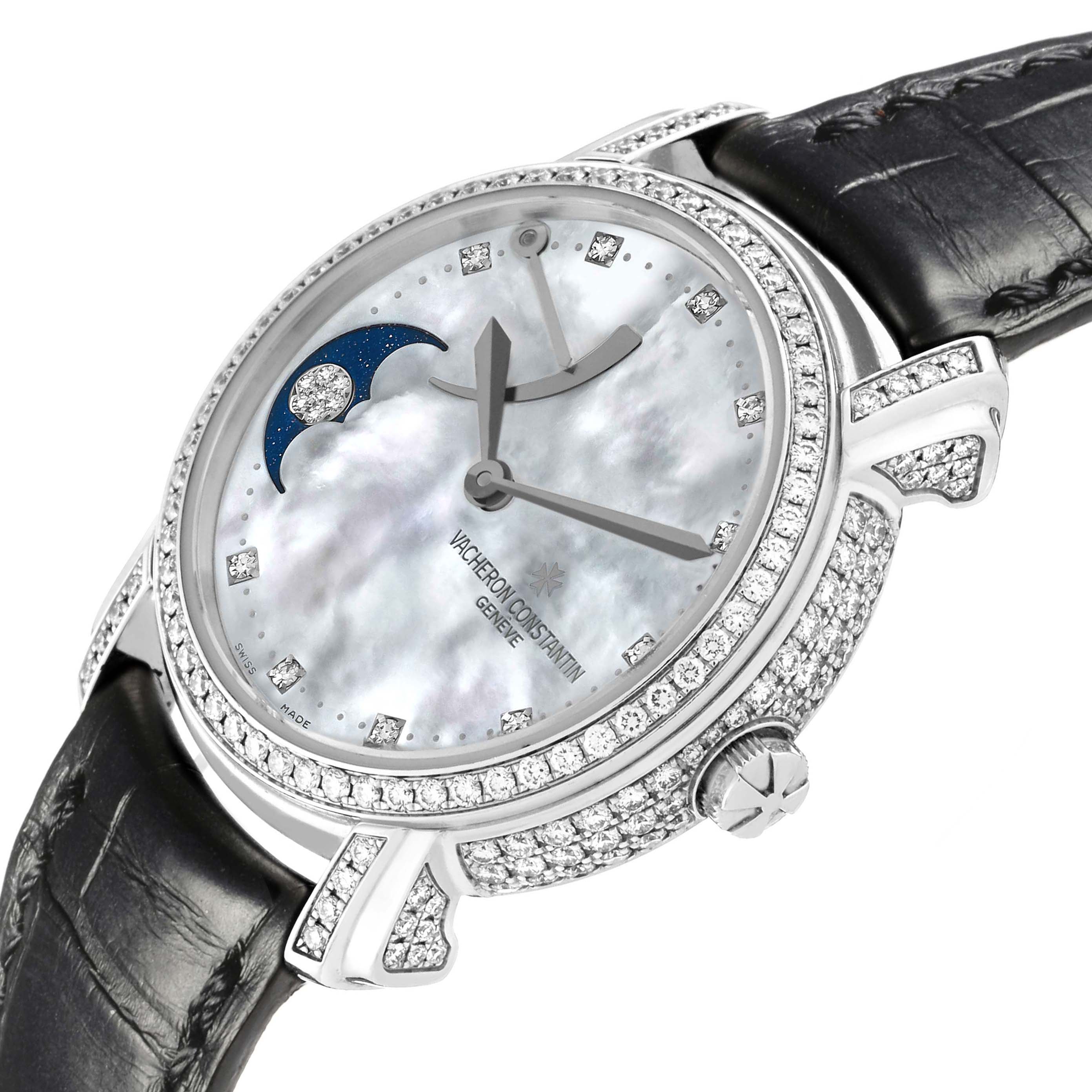 The Vacheron Constantin Malte 83505/000G Women's White Gold Mother of Pearl Dial 83505/000G Women's White Gold Mother of Pearl Dial watch is shown at an angle highlighting the diamond-encrusted bezel, dial, and black leather strap.