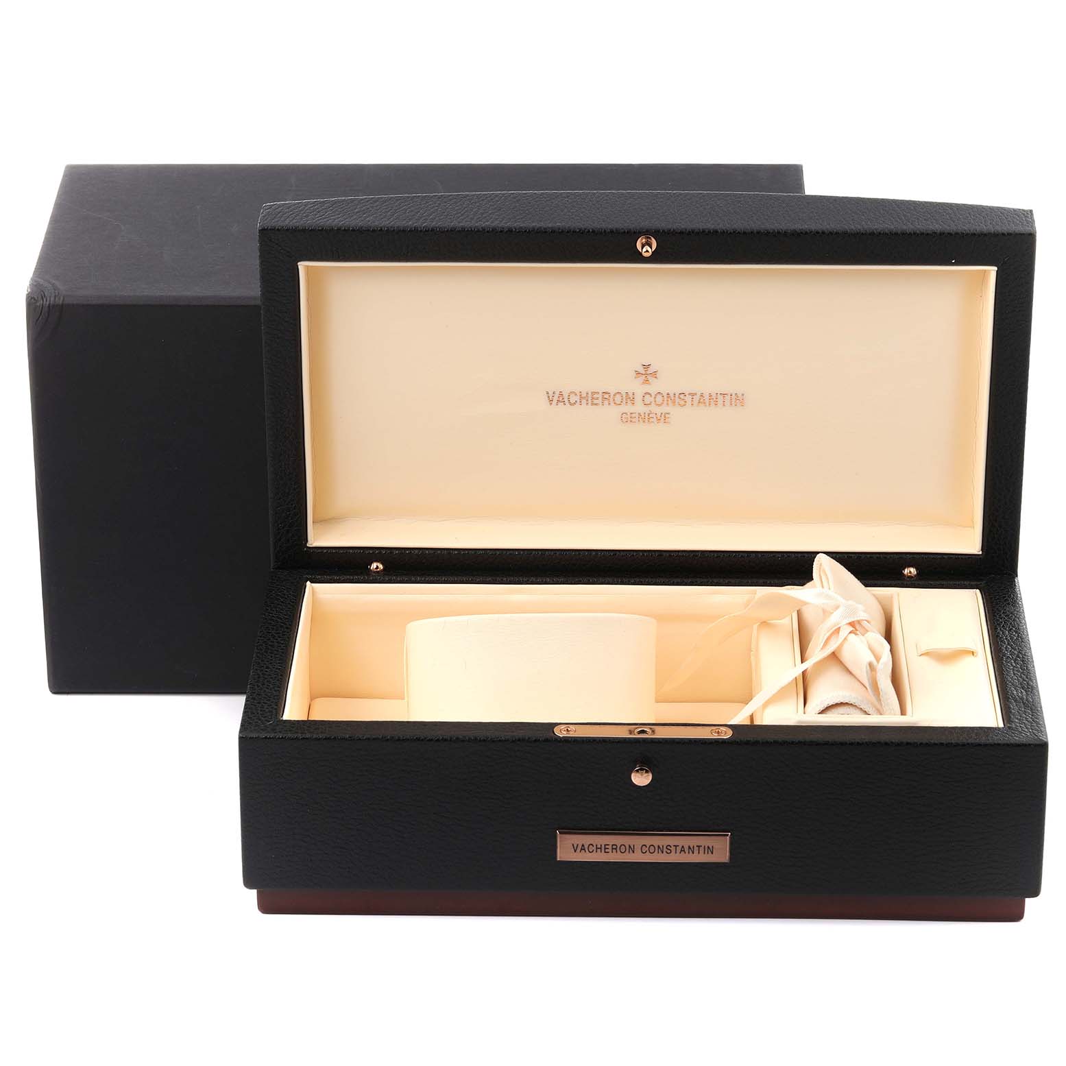 The image shows a Vacheron Constantin Malte 83505/000G Women's White Gold Mother of Pearl Dial 83505/000G Women's White Gold Mother of Pearl Dial watch box with a pillow and a rolled pouch inside.