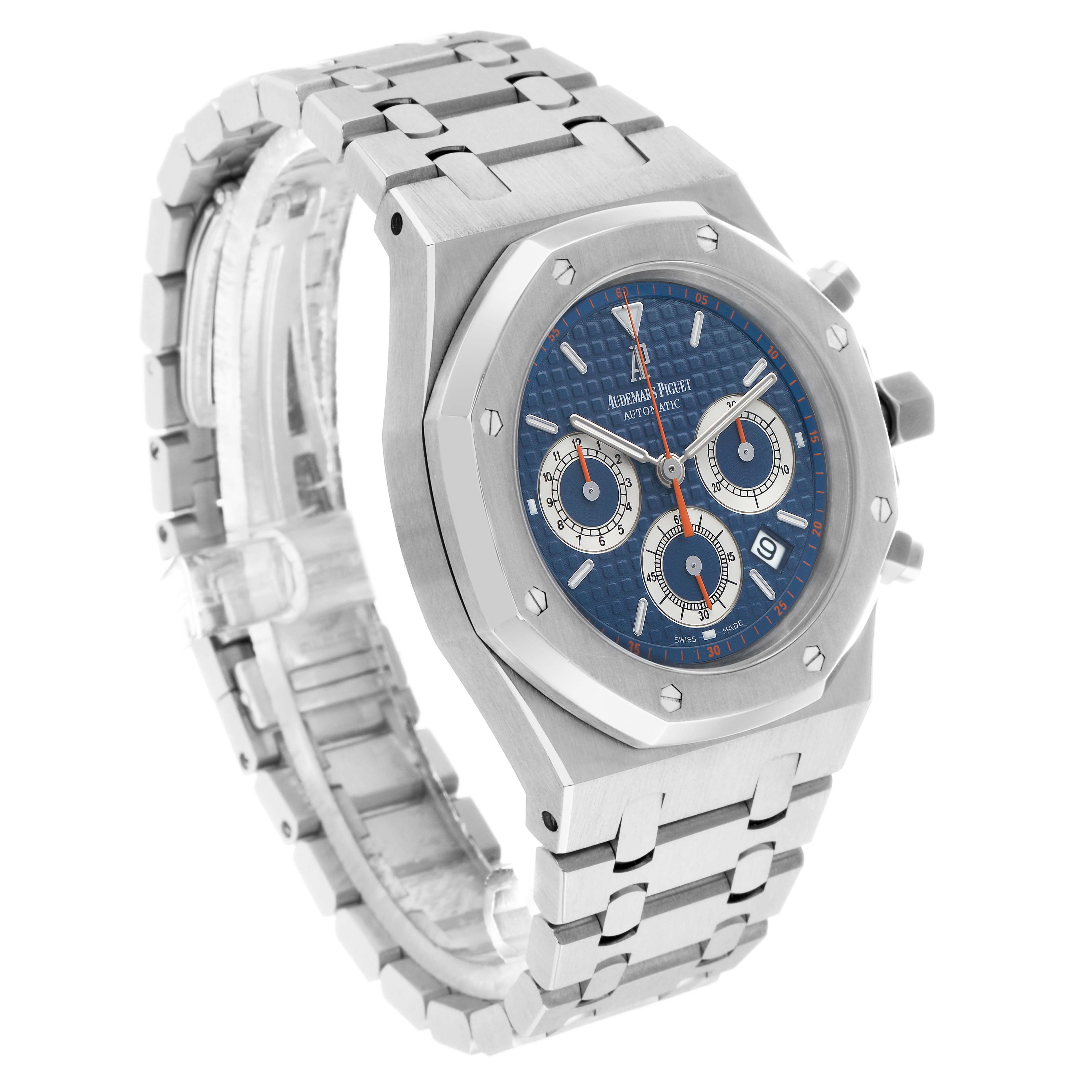 The Royal Oak by Audemars Piguet is shown at a three-quarter angle, highlighting the blue dial, chronograph subdials, case, and bracelet.