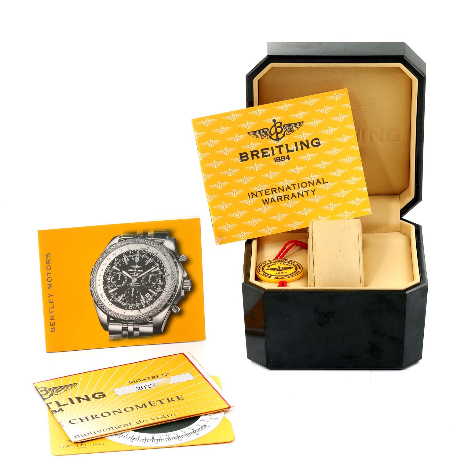 This image shows the packaging, international warranty card, manual, and chronometer certificate for the Breitling Bentley A25362 Men's Stainless Steel Black Dial A25362 Men's Stainless Steel Black Dial watch model.