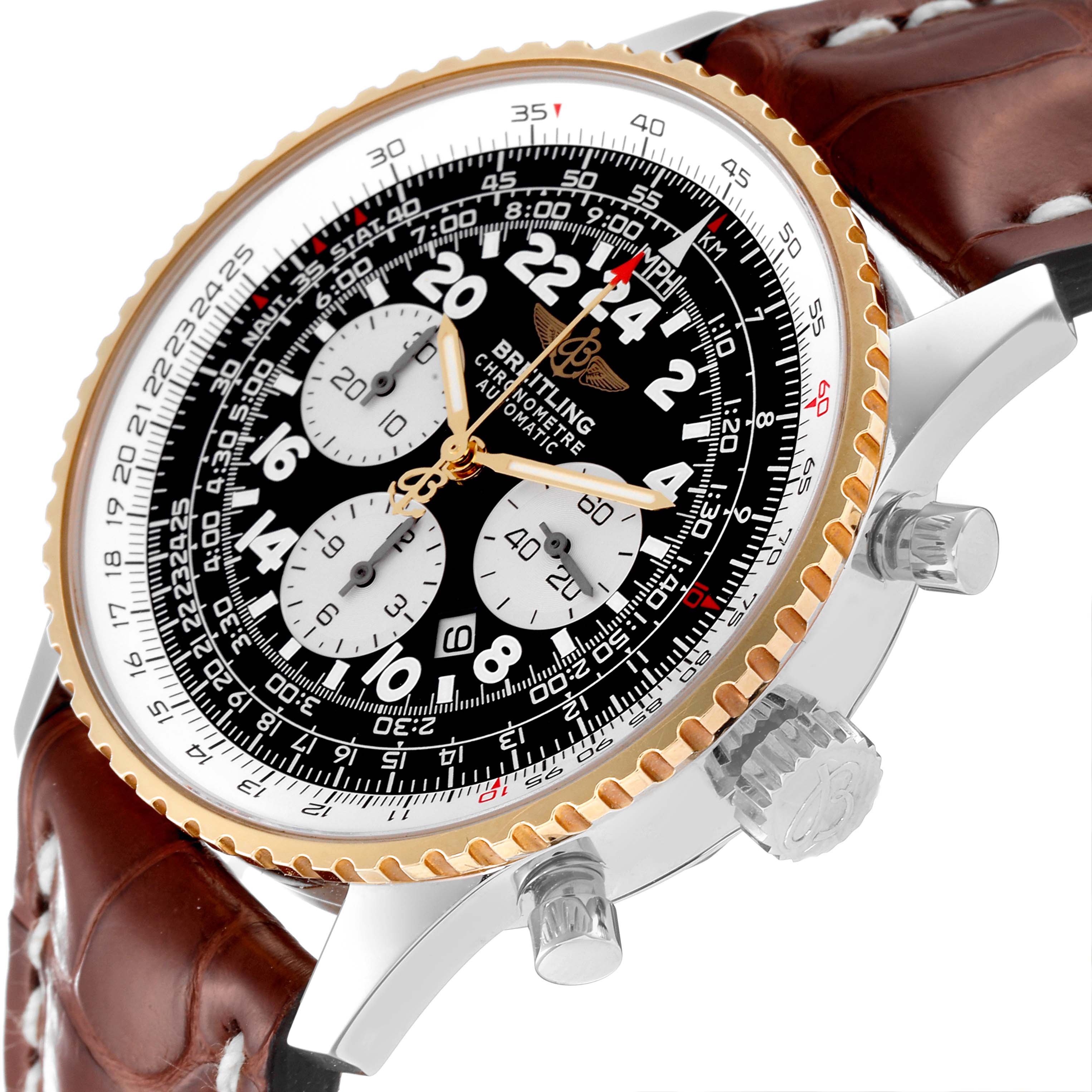 The image displays a Breitling Navitimer D22322 Men
s Stainless Steel Black Dial D22322 Men
s Stainless Steel Black Dial watch at an angle focusing on the dial, bezel, crown, and part of the brown leather strap.