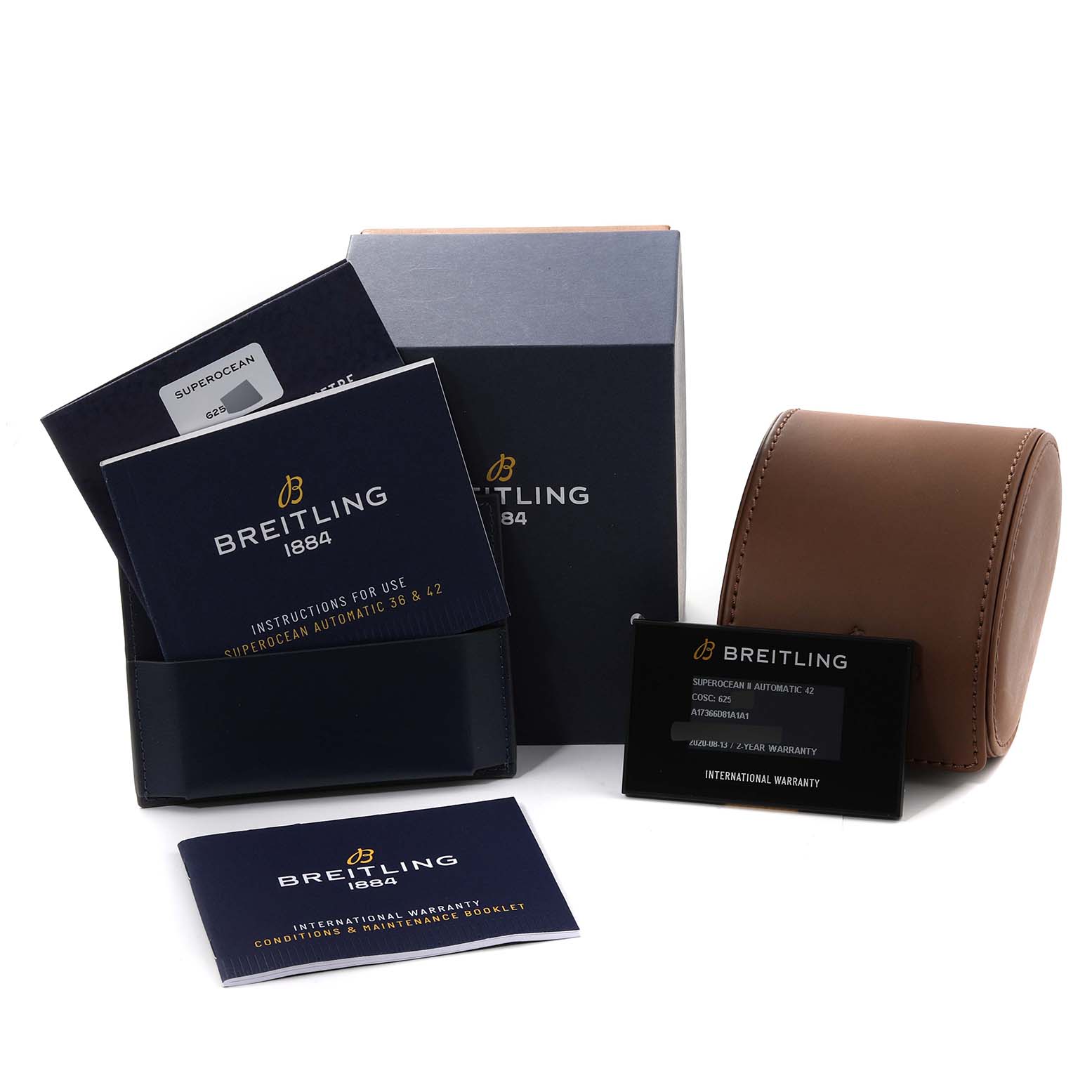 This image shows the packaging and documentation for the Breitling Superocean A17366 Men's Stainless Steel White Dial A17366 Men's Stainless Steel White Dial, including manuals, warranty cards, and a watch case.