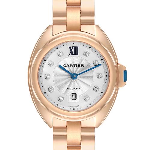 The Cartier Clé watch is shown from a front view, highlighting the face, bezel, and part of the band.