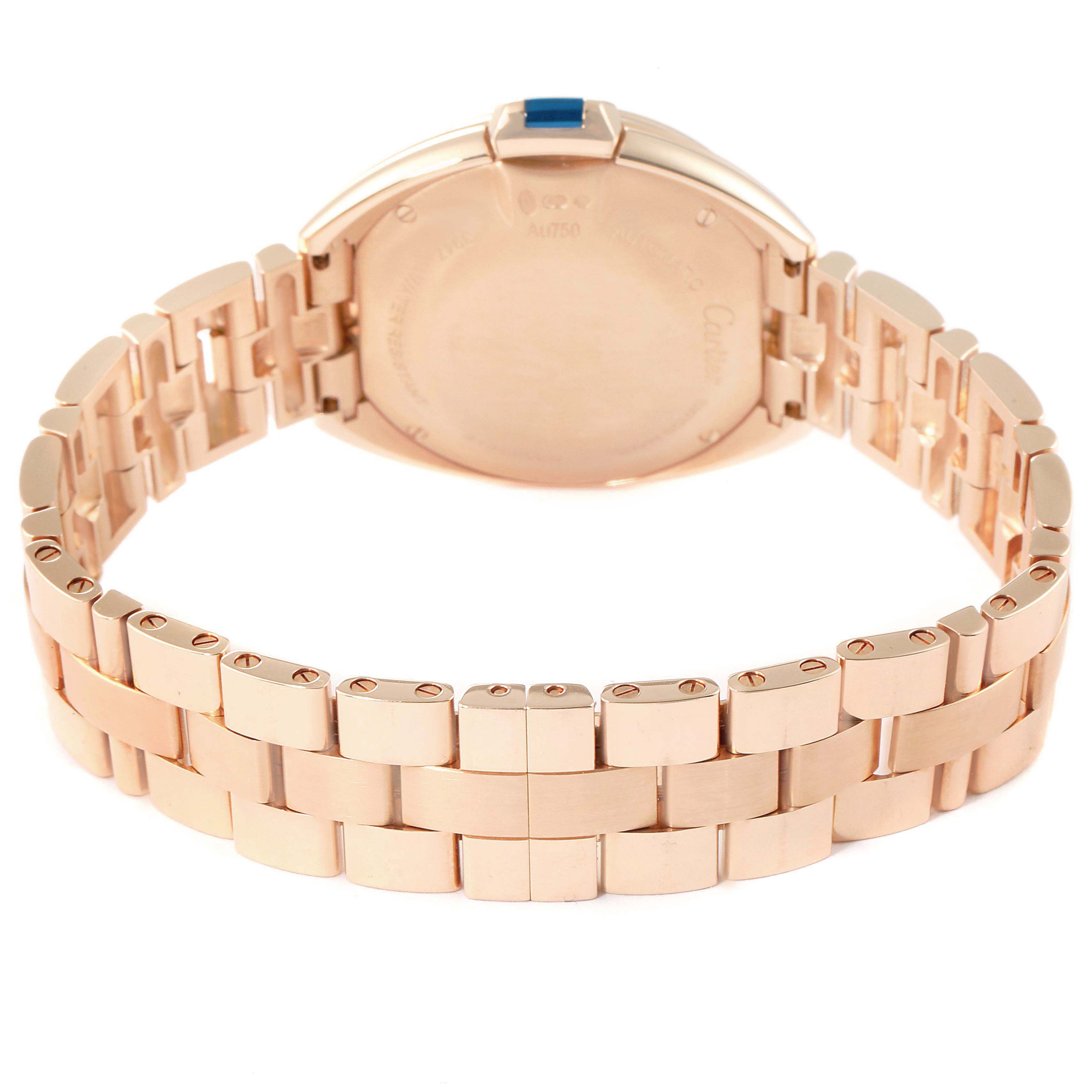 The image shows the back view of a Cartier Clé watch, highlighting the rose gold bracelet and case.