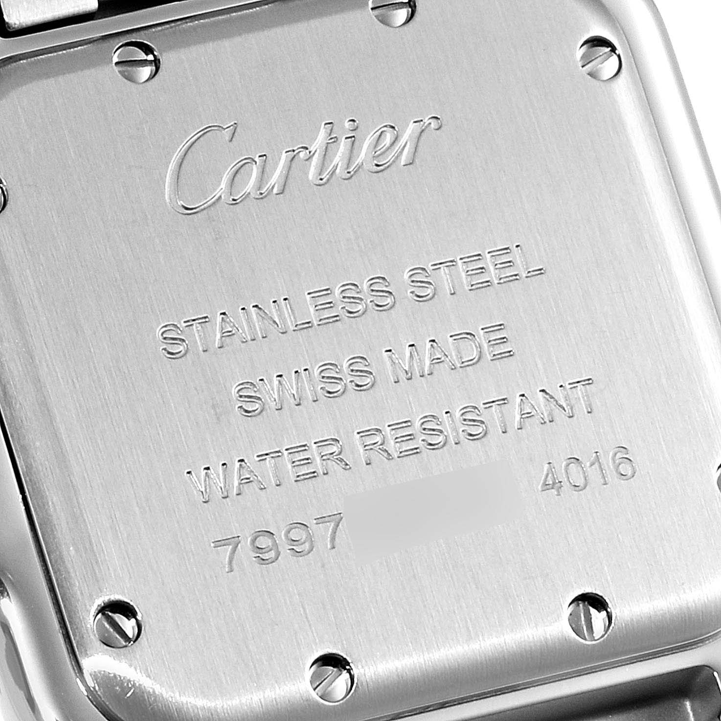 The image shows the back case of a Cartier Panthere WSPN0007 Women's Stainless Steel Silver Dial WSPN0007 Women's Stainless Steel Silver Dial watch, displaying engravings and screws.