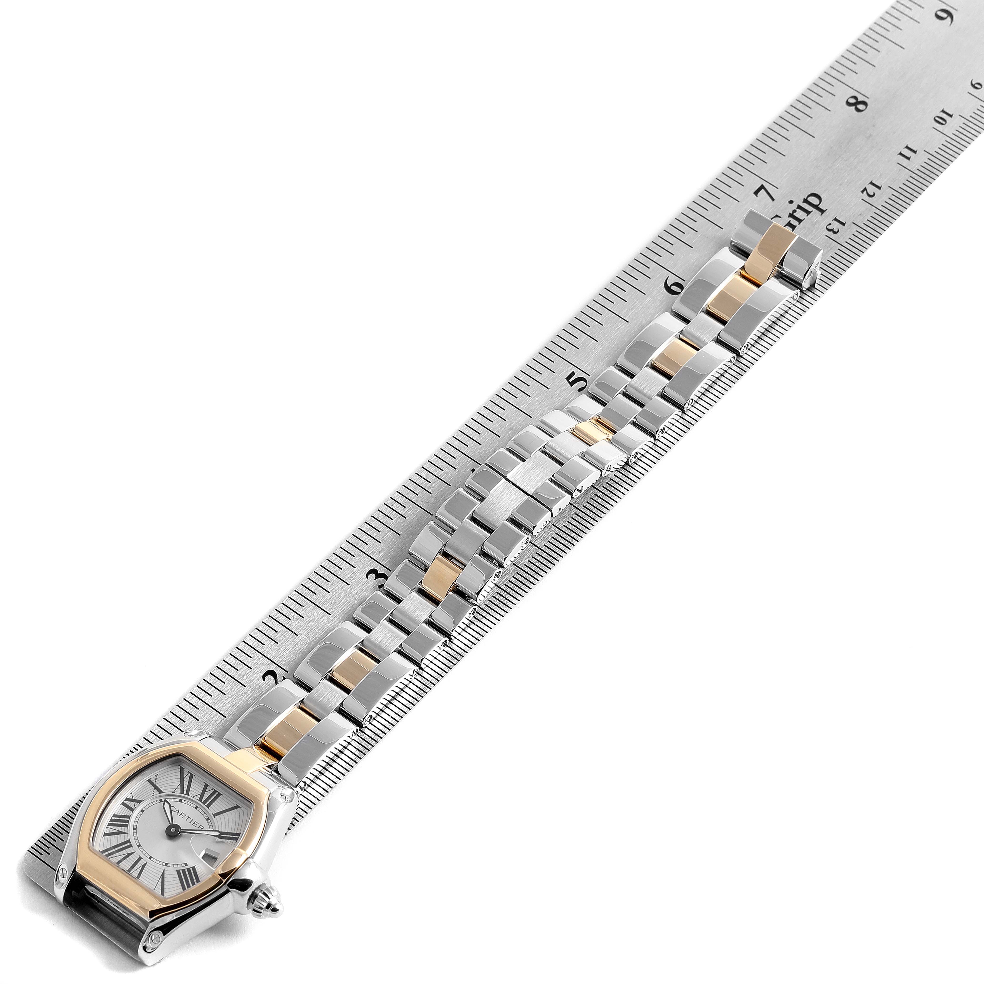 The image shows the face and band of a Cartier Roadster W62026Y4 Women's Steel and Gold (two tone) Silver Dial W62026Y4 Women's Steel and Gold (two tone) Silver Dial watch, measured against a ruler from a top-down view.