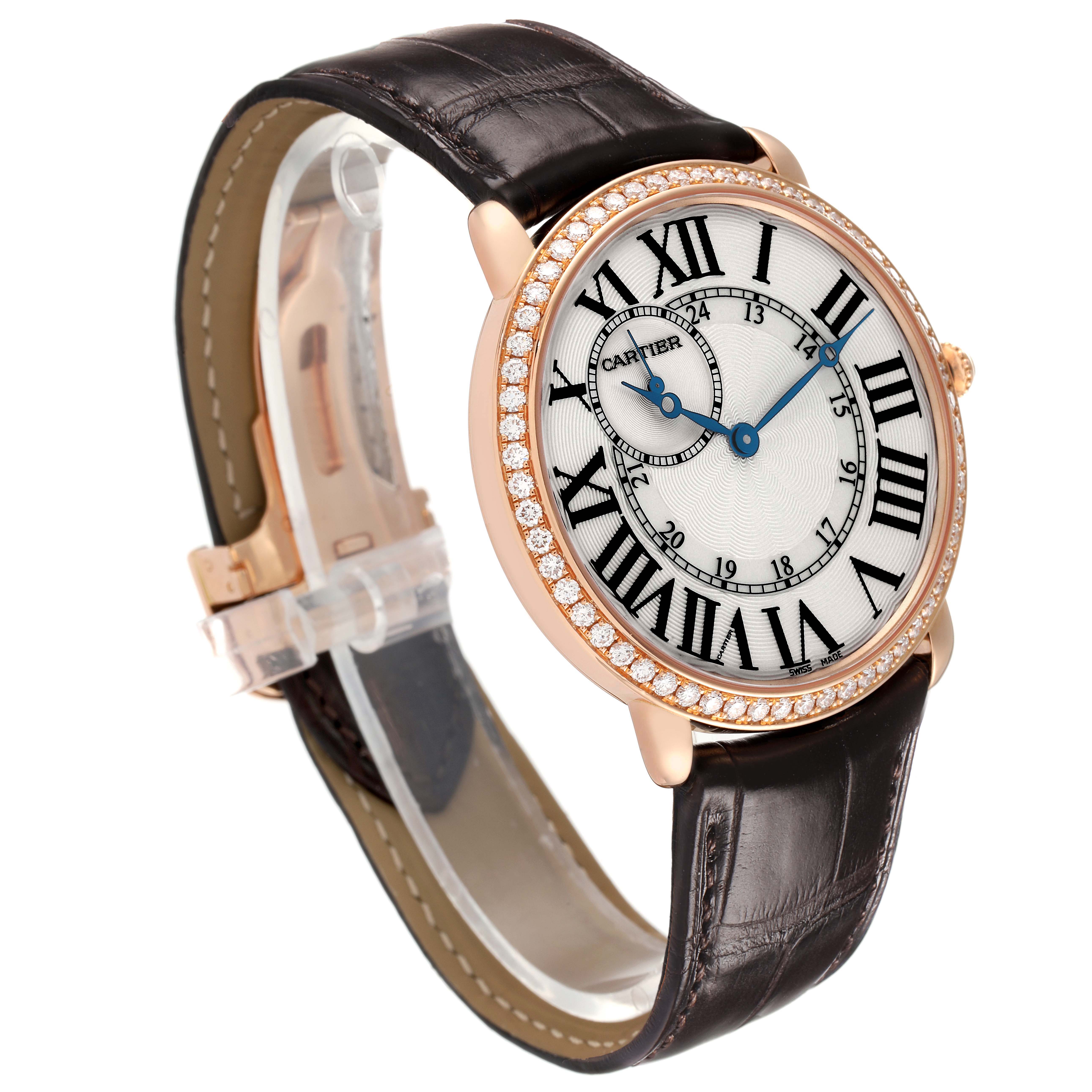 The Cartier Ronde WR007001 Men's Rose Gold Silver Dial watch is shown at a slight angle, displaying the face, diamond bezel, and leather strap.