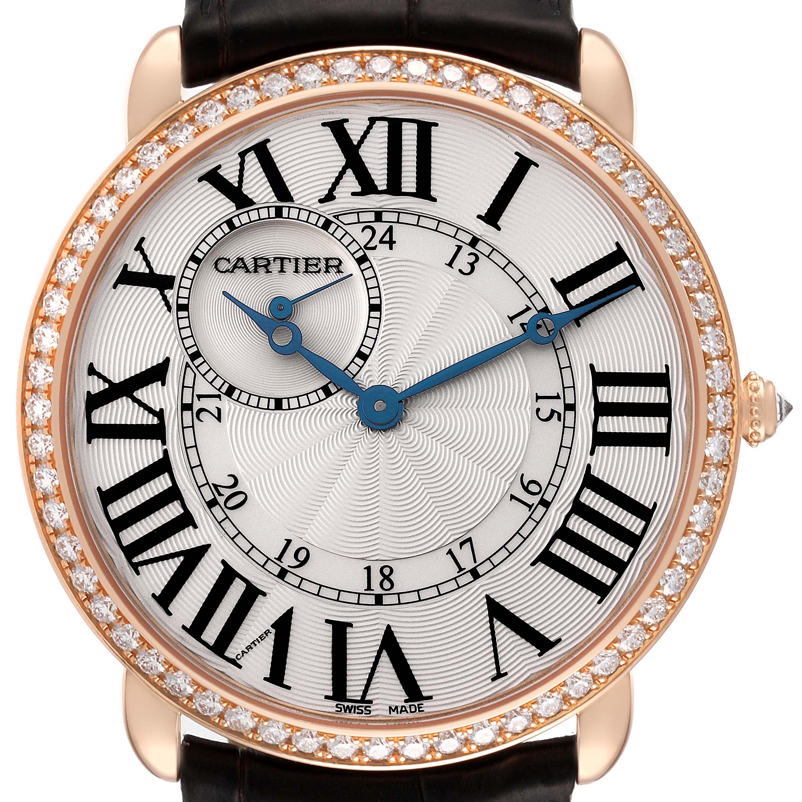 The Cartier Ronde WR007001 Men's Rose Gold Silver Dial watch is shown from a front angle, featuring Roman numerals, blue hands, and a diamond-encrusted bezel.