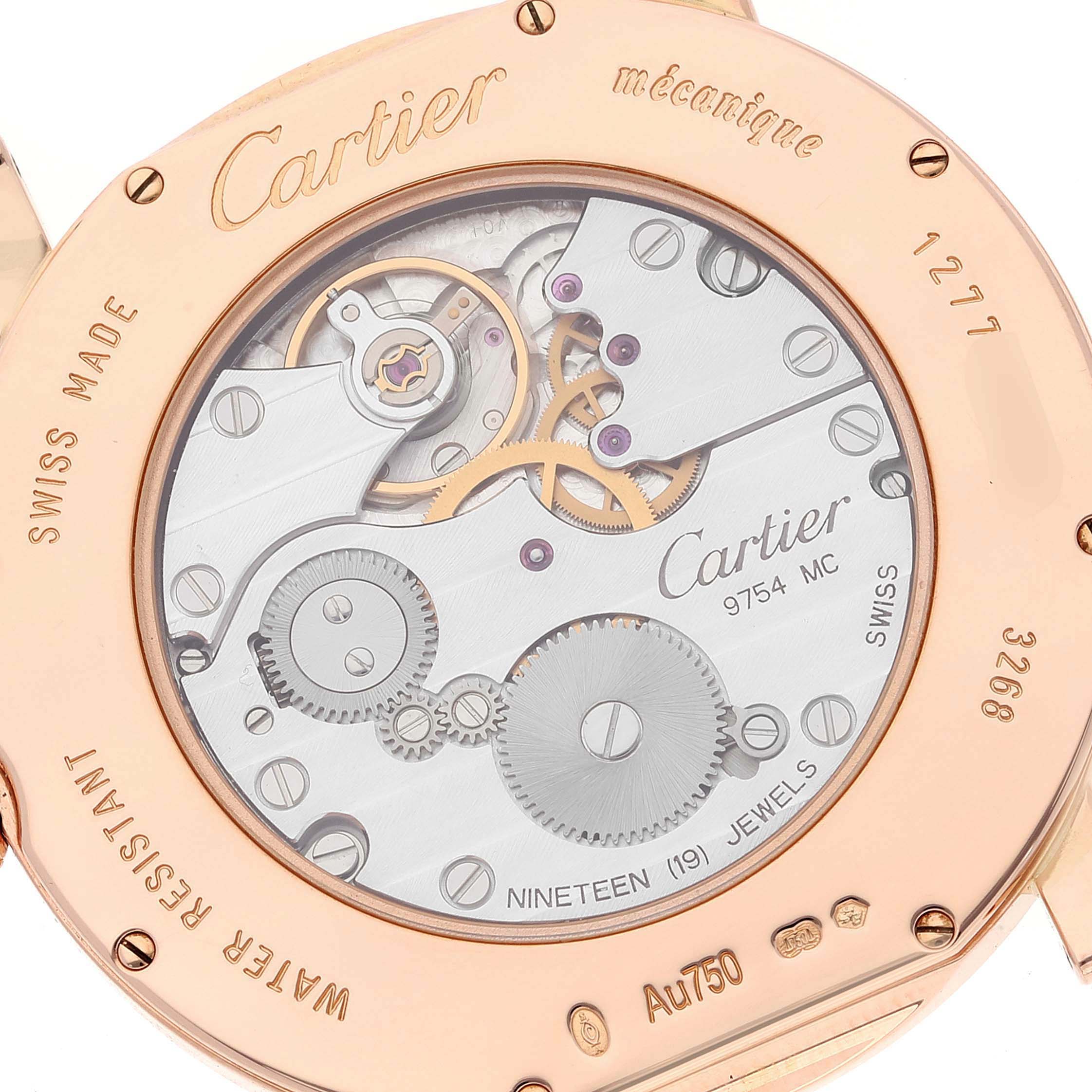 The image shows the back view of a Cartier Ronde WR007001 Men's Rose Gold Silver Dial watch, focusing on its mechanical movement and engraved details.