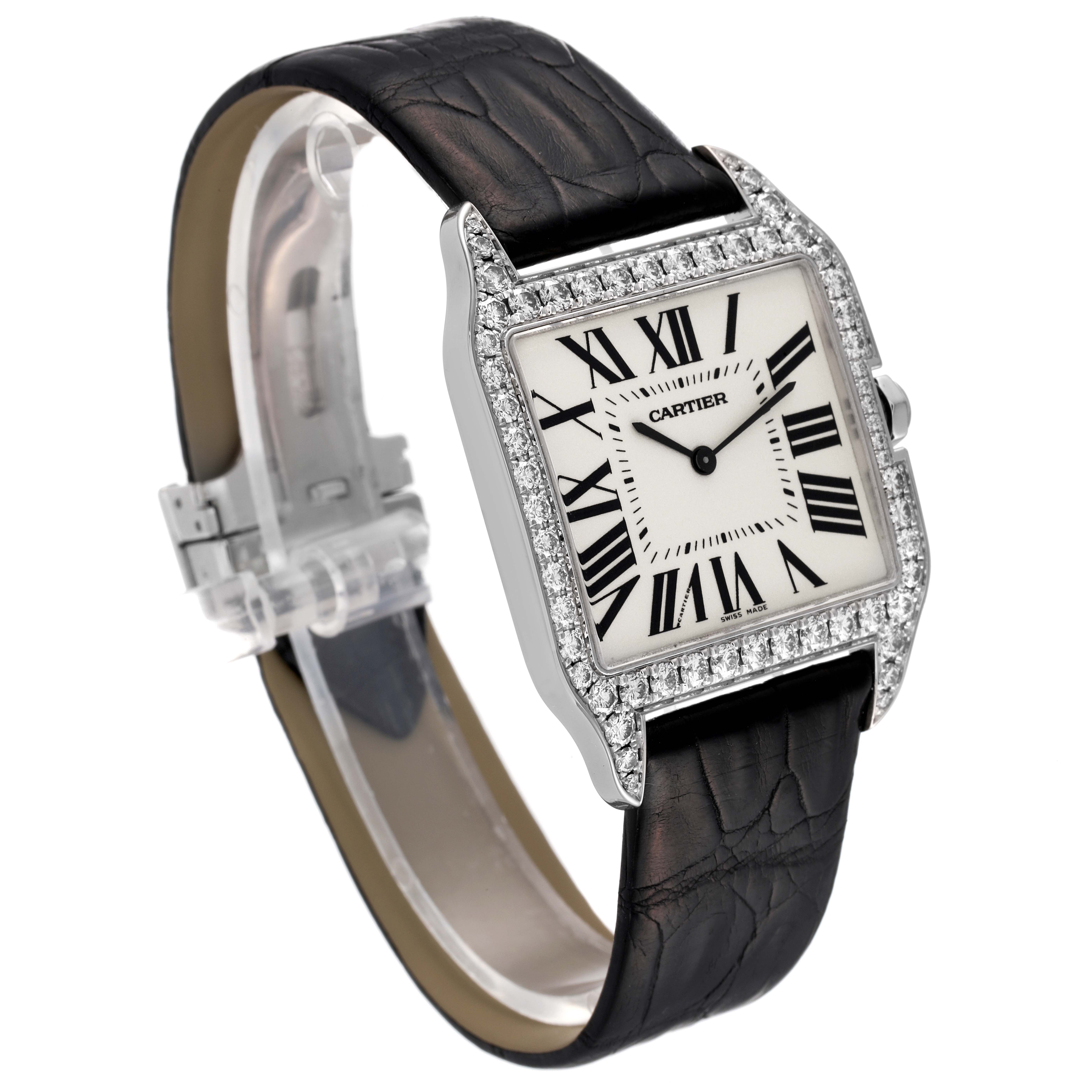 The Cartier Santos Dumont WH100651 Men's White Gold Silver Dial WH100651 Men's White Gold Silver Dial watch is shown at a slight angle, highlighting its face, strap, and diamond-studded bezel.