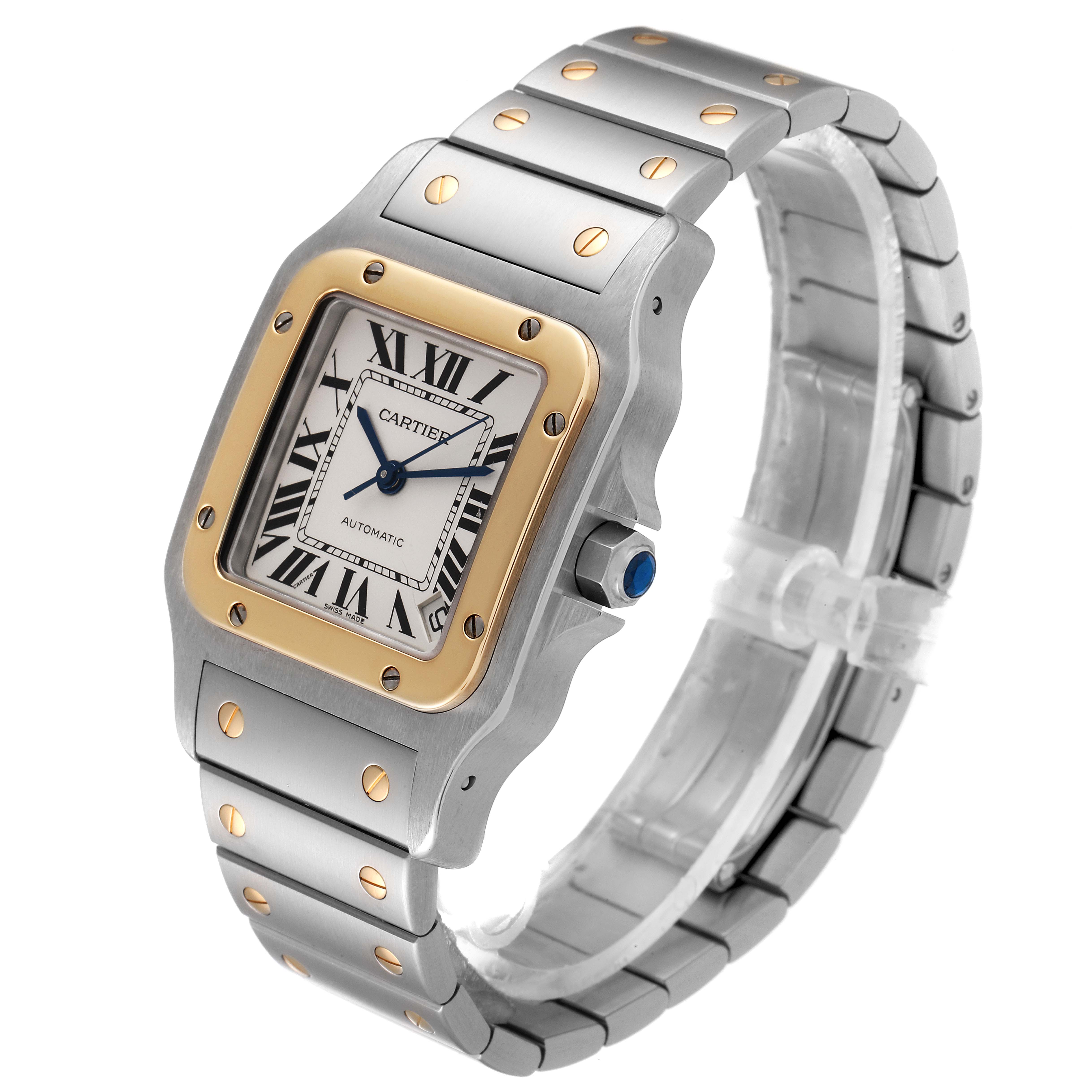The Cartier Santos W20099C4 Men's Steel and Gold (two tone) Silver Dial W20099C4 Men's Steel and Gold (two tone) Silver Dial watch is shown at an angle highlighting the face, bezel, and metal bracelet.