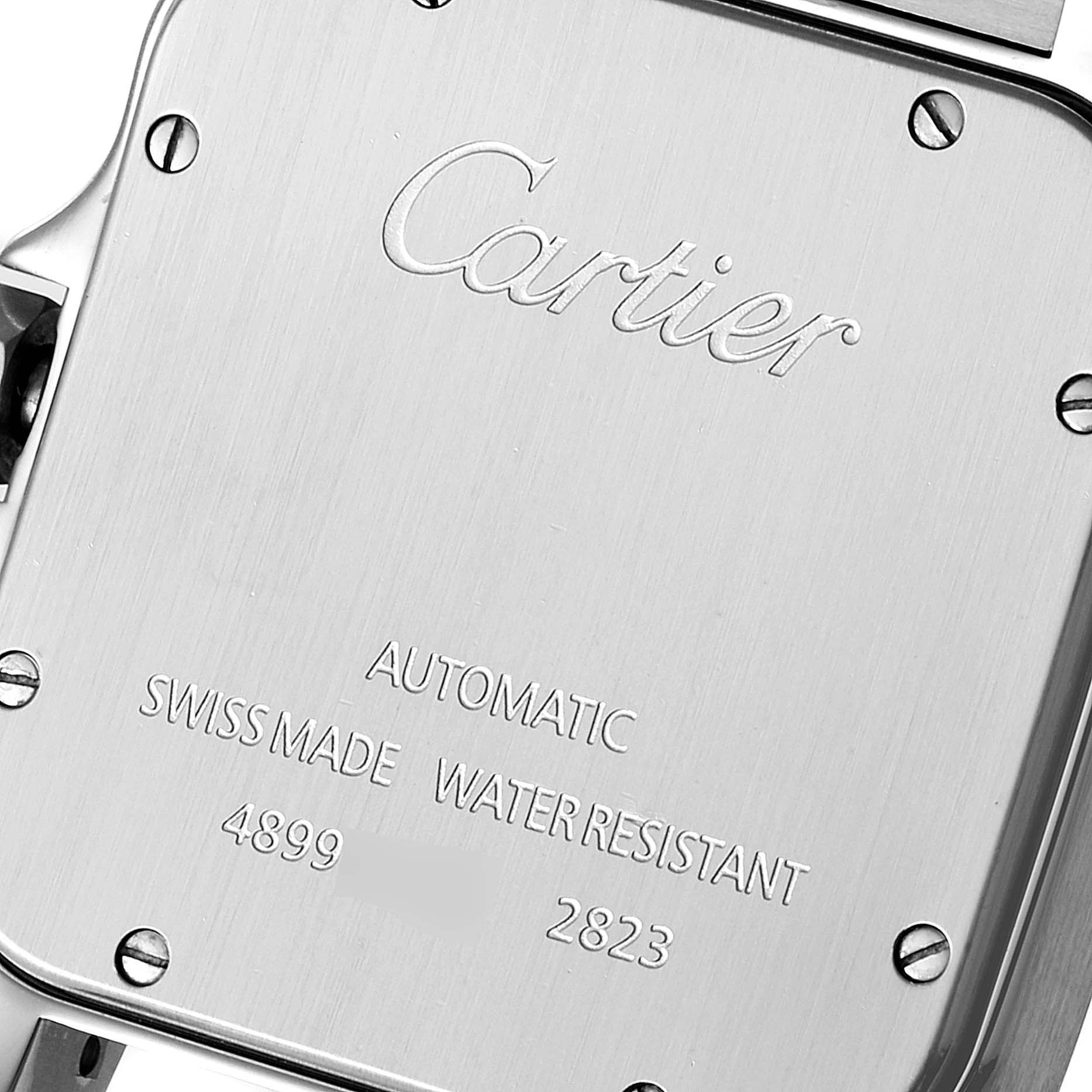 This is the back view of a Cartier Santos W20099C4 Men's Steel and Gold (two tone) Silver Dial W20099C4 Men's Steel and Gold (two tone) Silver Dial model watch, showing the engravings and screws.