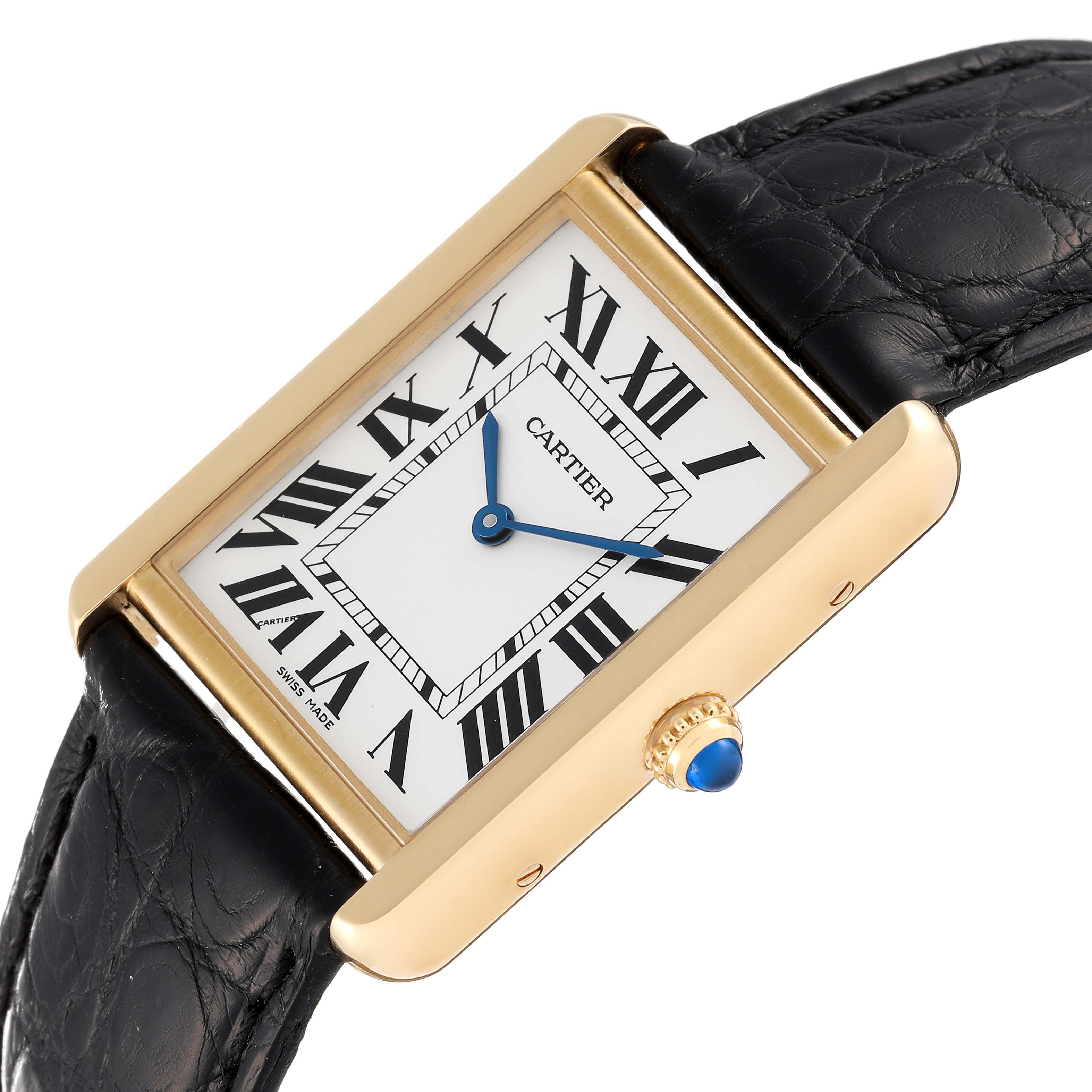 This Cartier Tank Solo W5200004 Men
s Yellow Gold Silver Dial W5200004 Men
s Yellow Gold Silver Dial watch is shown from a slightly angled top view, highlighting its face, case, crown, and leather strap.
