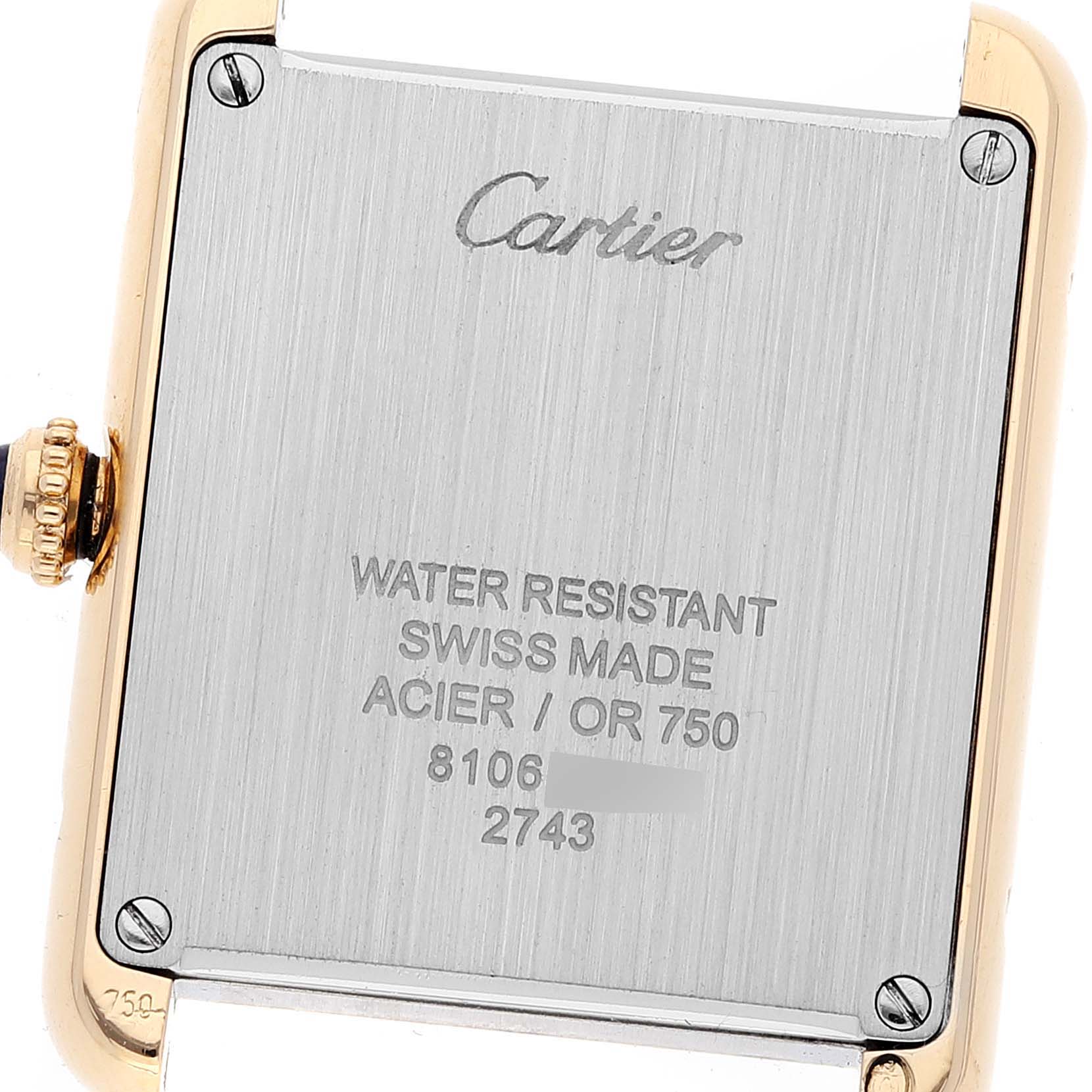 This image shows the backplate of a Cartier Tank Solo W1018755 Women's Yellow Gold Silver Dial W1018755 Women's Yellow Gold Silver Dial watch at a slight angle.