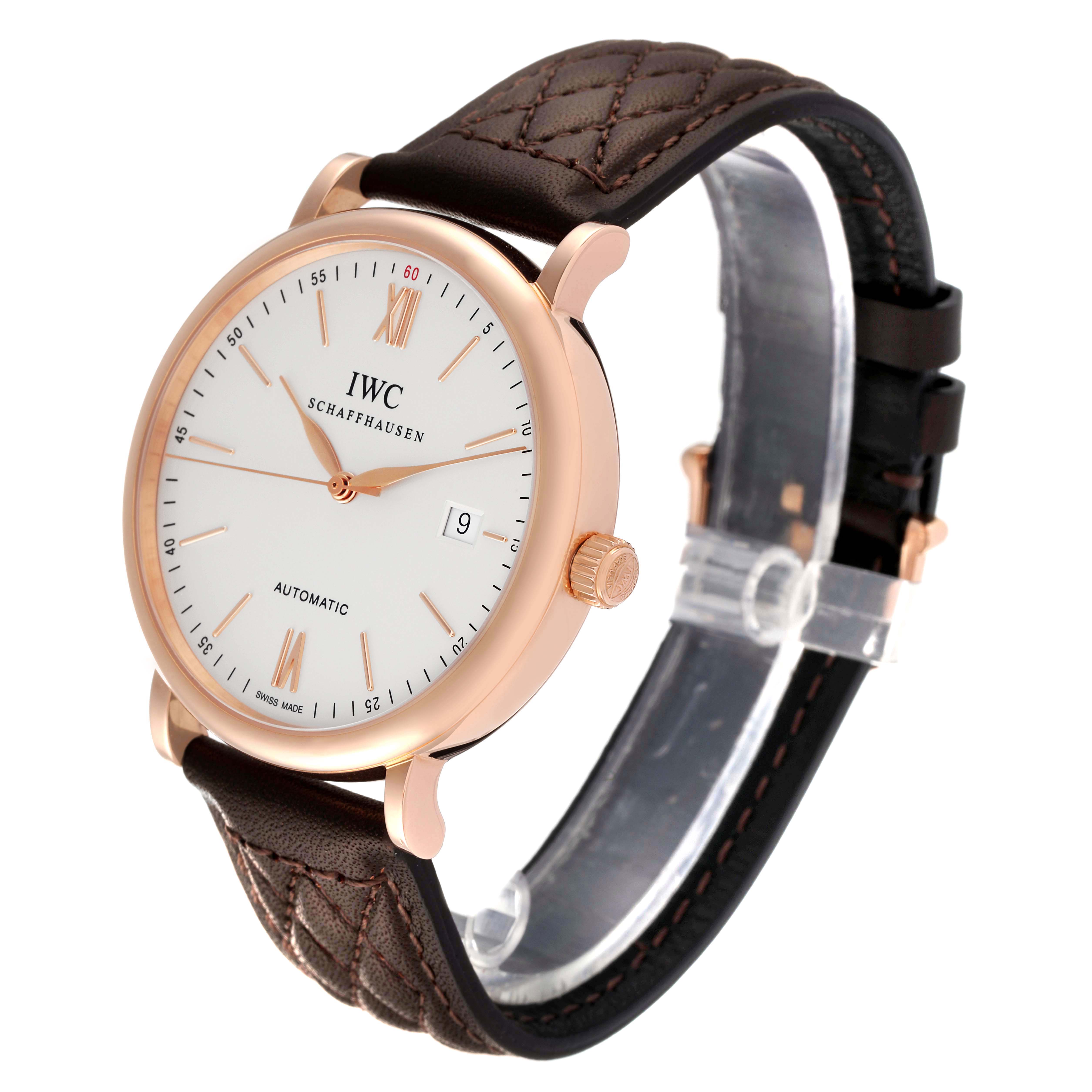 The IWC Portofino IW356504 Men's Rose Gold Silver Dial IW356504 Men's Rose Gold Silver Dial watch is shown at a front-side angle, displaying the dial, crown, and leather strap.
