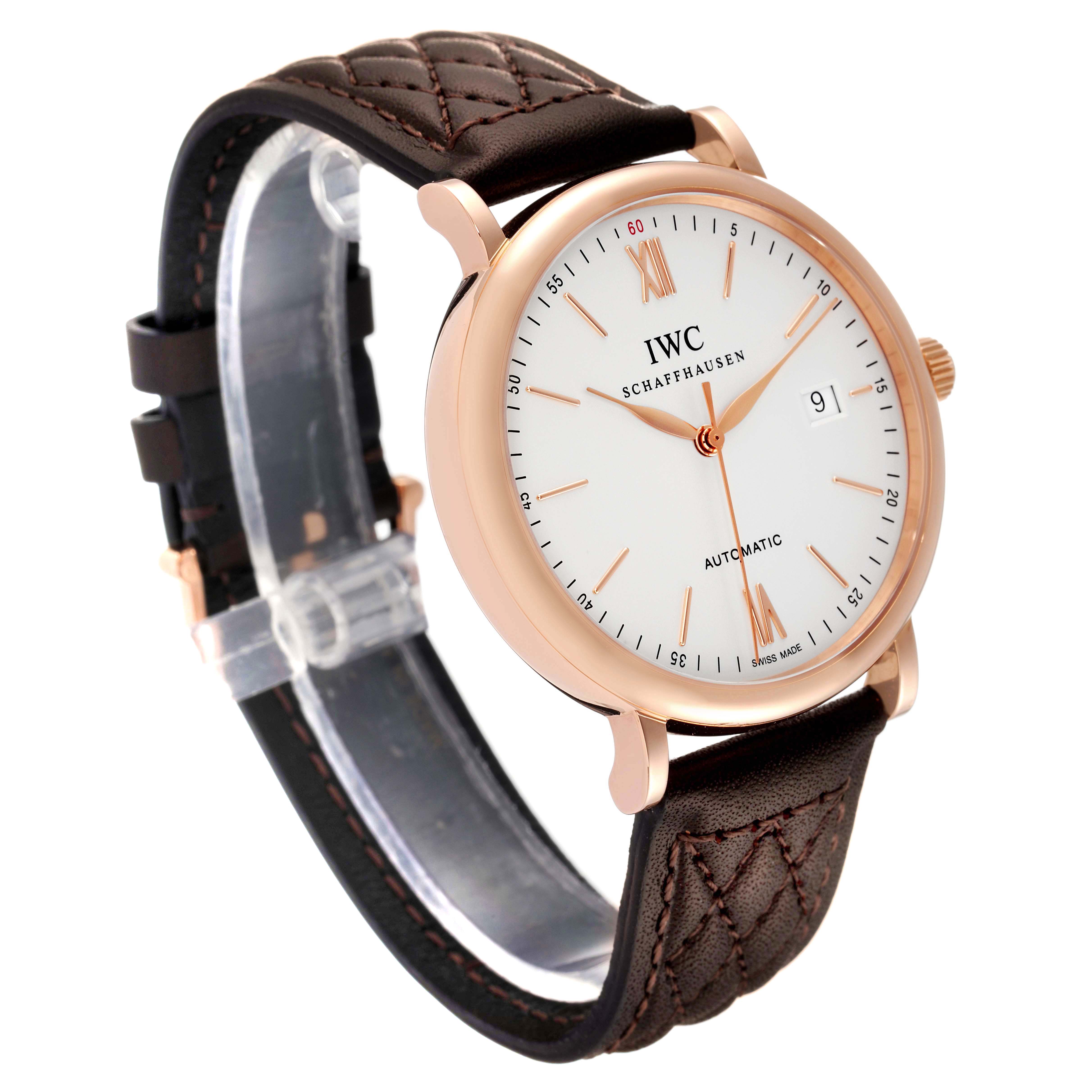 The image shows an angled view of the IWC Portofino IW356504 Men's Rose Gold Silver Dial IW356504 Men's Rose Gold Silver Dial watch, highlighting its white dial, gold-tone case, and brown leather strap.