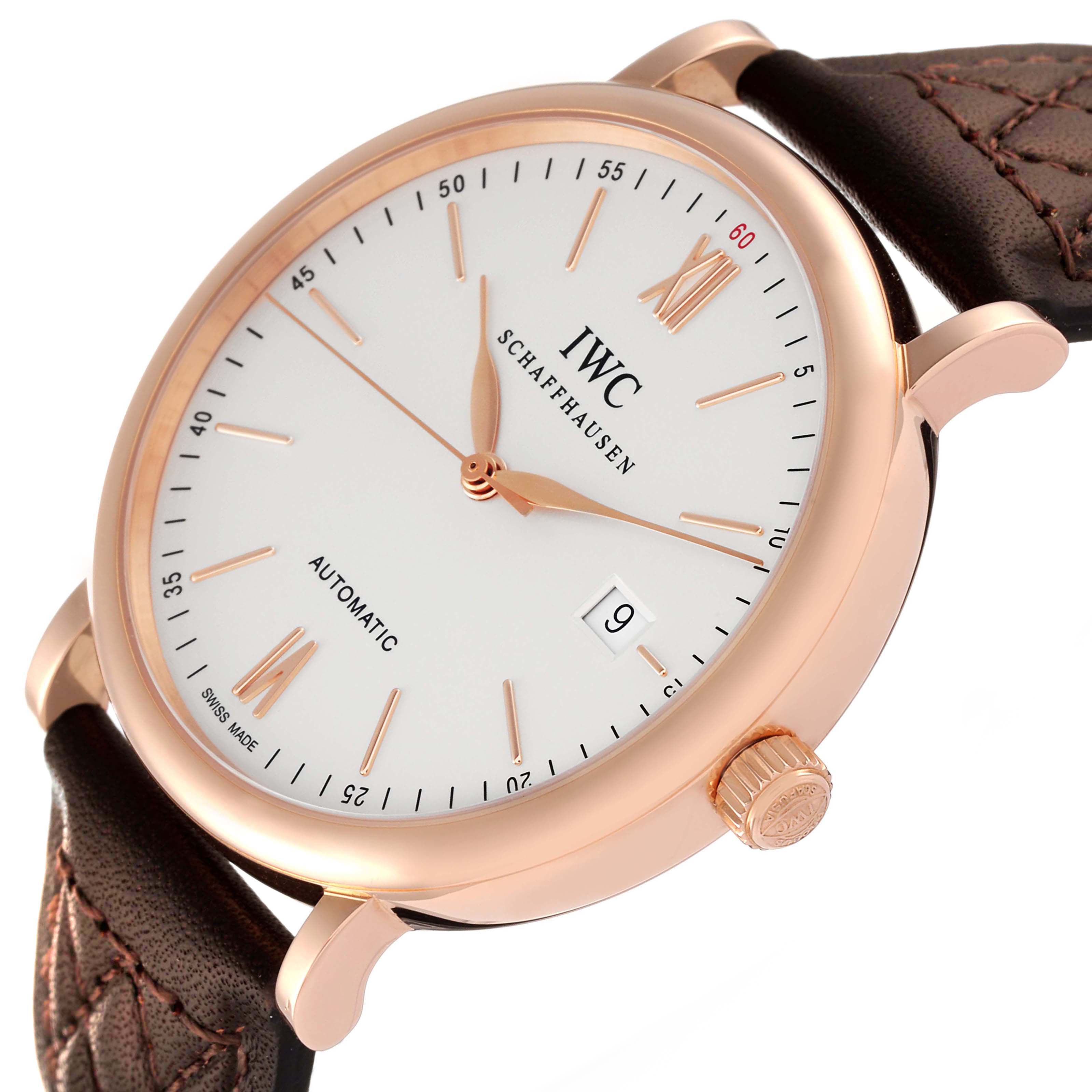 The IWC Portofino IW356504 Men's Rose Gold Silver Dial IW356504 Men's Rose Gold Silver Dial watch is shown at an angled view, displaying the face, crown, and leather strap.