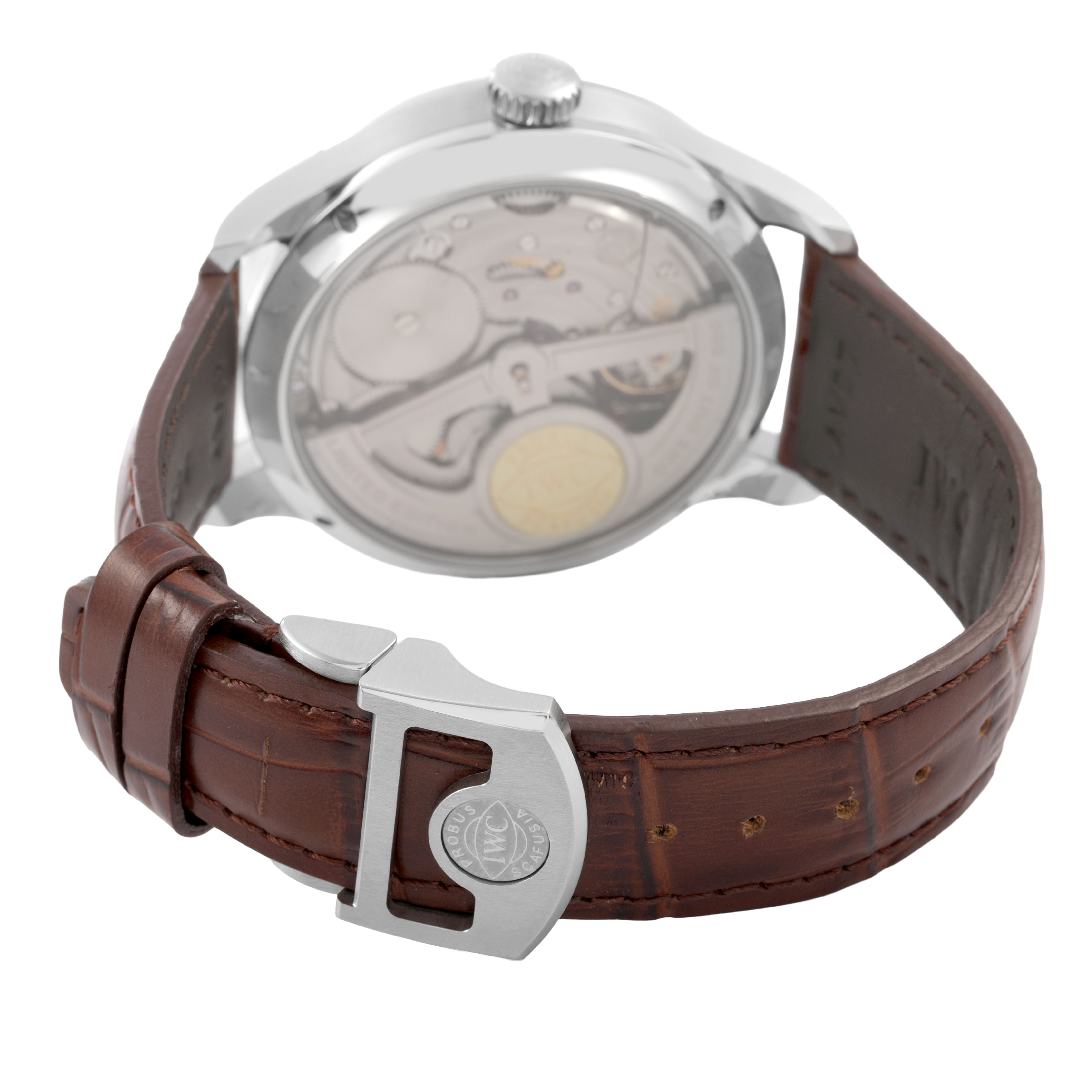 The image shows the back and clasp of an IWC Portuguese IW502308 Men's Stainless Steel Silver Dial watch, highlighting its movement and brown leather strap.