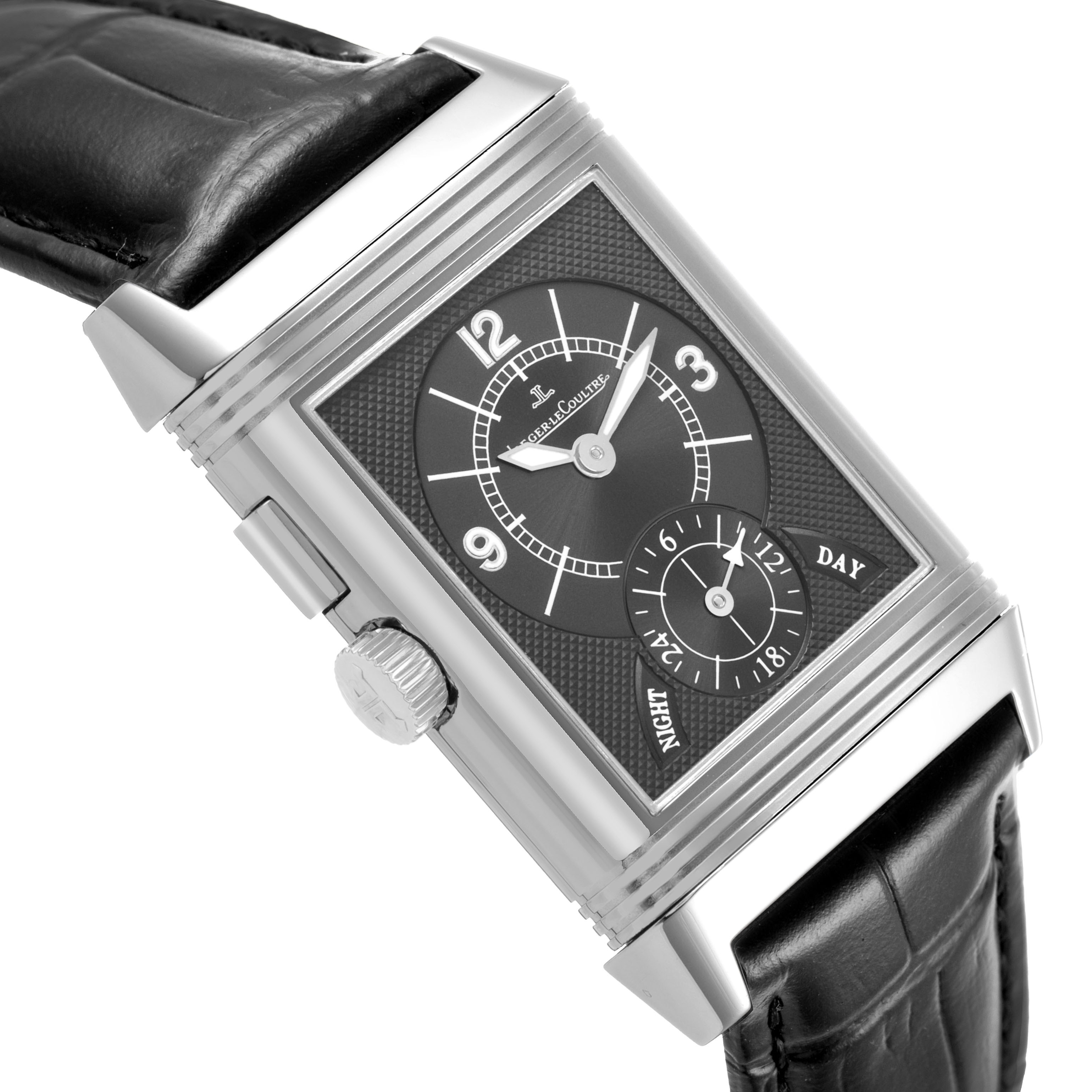The Jaeger-LeCoultre Reverso watch is shown at a slightly angled side view, displaying the dial, crown, and leather strap.