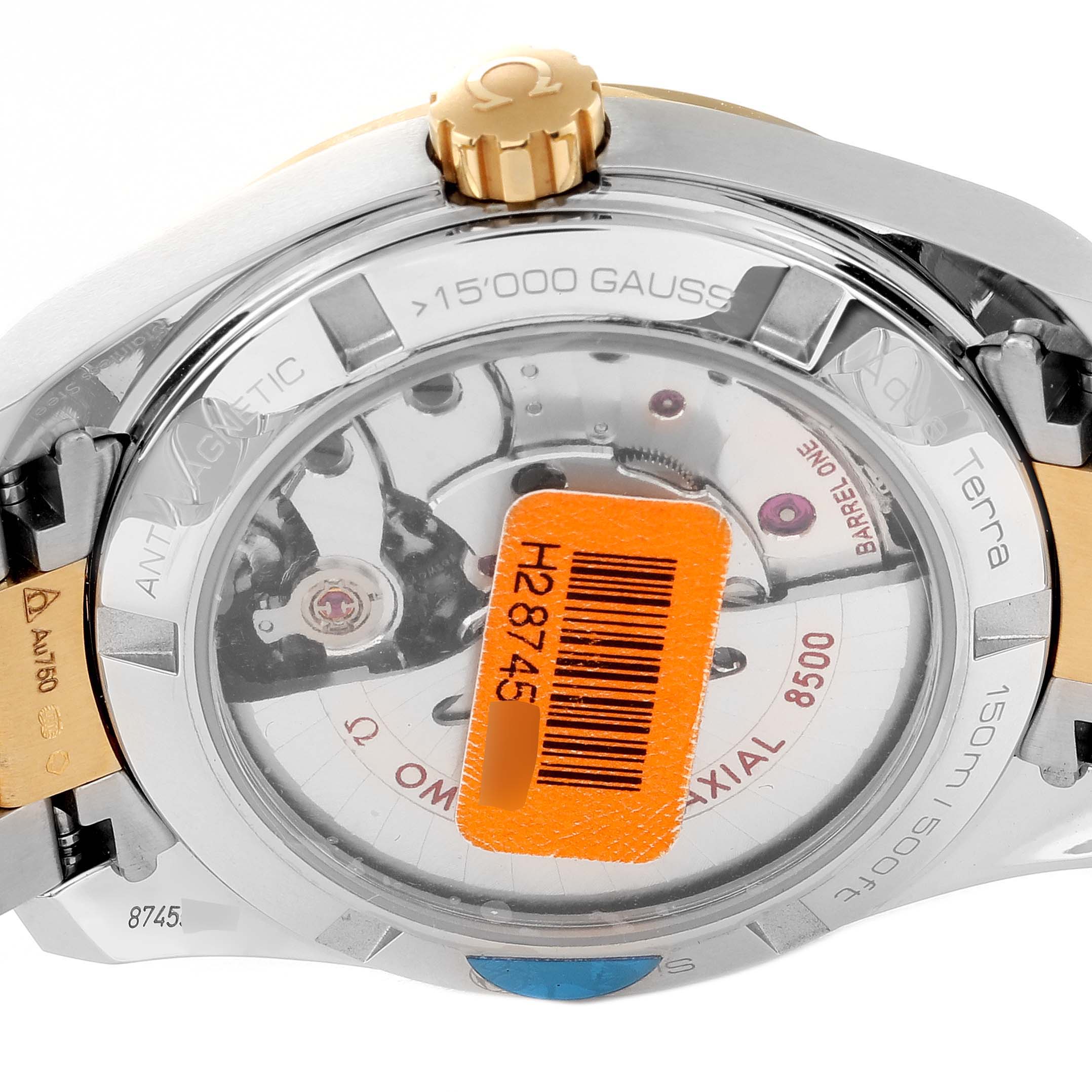 The image shows the back view of the Omega 231.25.39.21.55.002 Women
s Stainless Steel Mother of Pearl Dial 231.25.39.21.55.002 Women
s Stainless Steel Mother of Pearl Dial Aqua Terra Steel Yellow Gold Diamond Watch 231.25.39.21.55.002 showcasing its movement components.