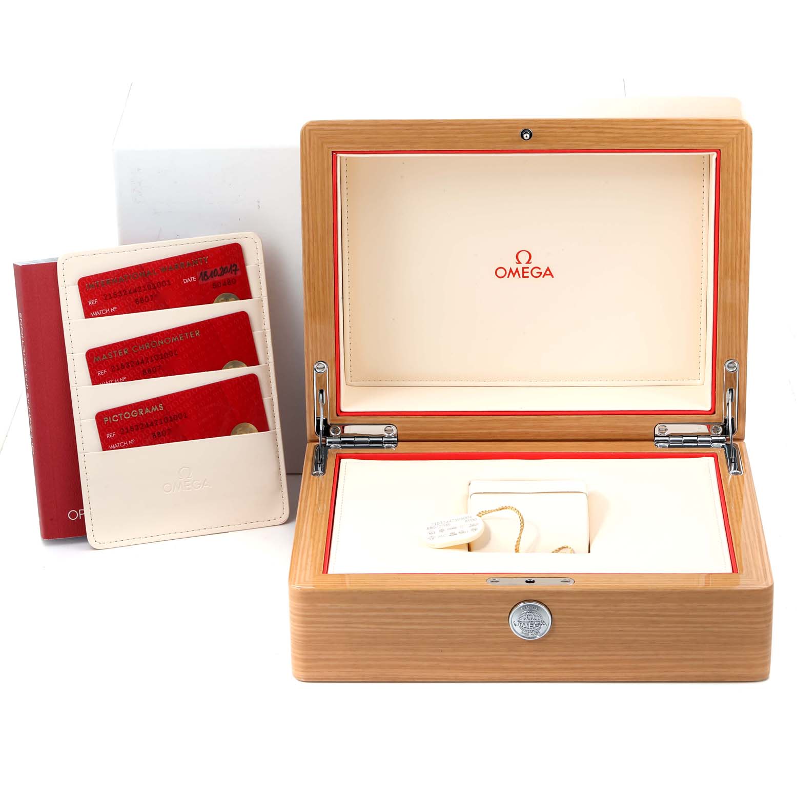 The image shows the open Omega Planet Ocean 215.32.44.21.01.001 Men's Stainless Steel Black Dial 215.32.44.21.01.001 Men's Stainless Steel Black Dial watch box and warranty cards/paperwork from a top angle.