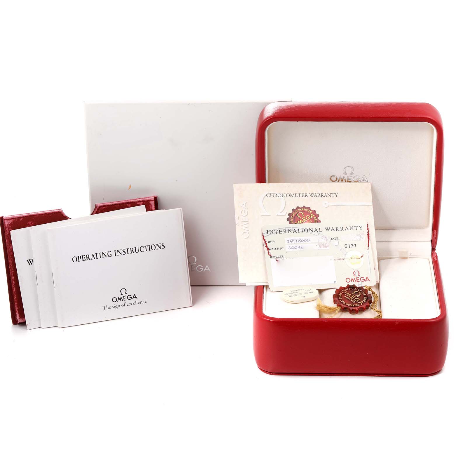 The image shows the packaging, international warranty card, tags, and operating instructions for an Omega Seamaster 2599.80.00 Men's Stainless Steel Blue Dial 2599.80.00 Men's Stainless Steel Blue Dial watch.