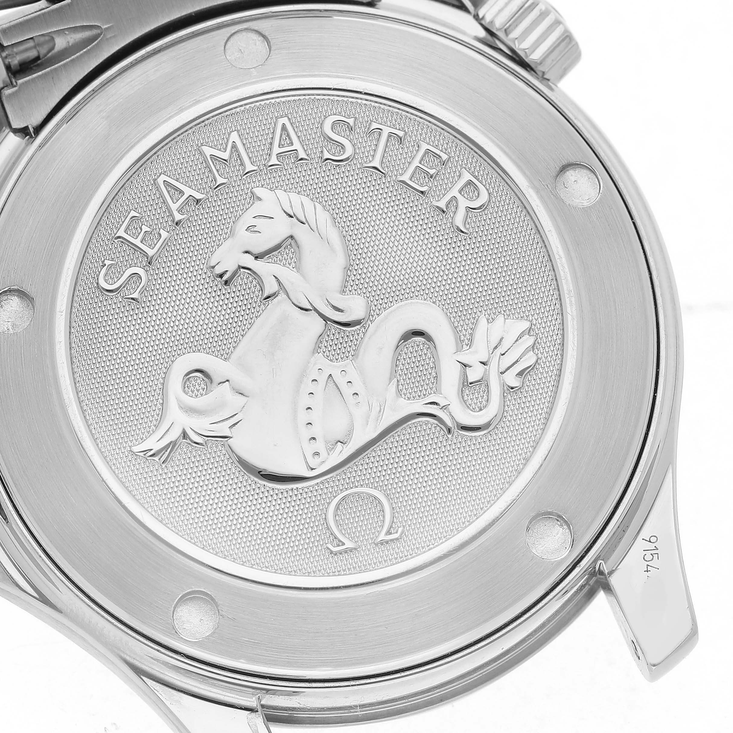 The image shows the back of an Omega Seamaster 212.30.36.61.01.001 Men's Stainless Steel Black Dial watch, highlighting the engraved logo and branding.